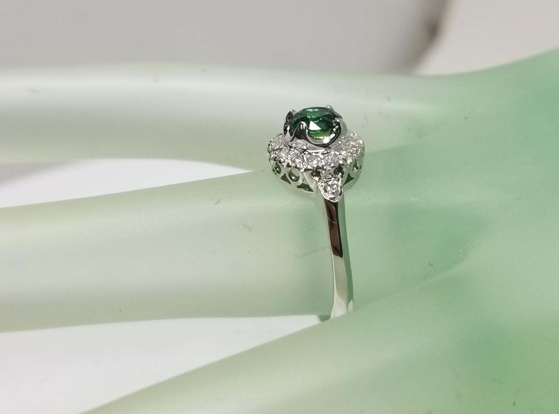 14 Karat White Gold Tsavorite and Diamond Halo Ring For Sale 2