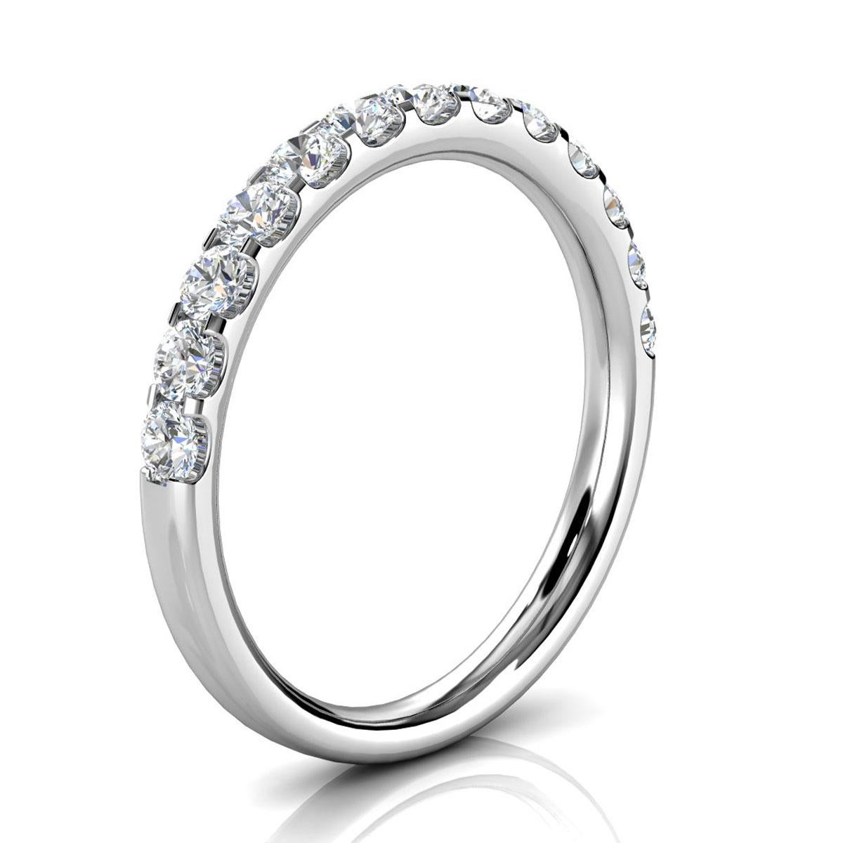 From our signature Micro-Prong wedding band collection, this ring features perfectly matched round brilliant diamonds throughout 50% of the shank. Experience the Difference!

Product details: 

Center Gemstone Color: WHITE
Side Gemstone Type: