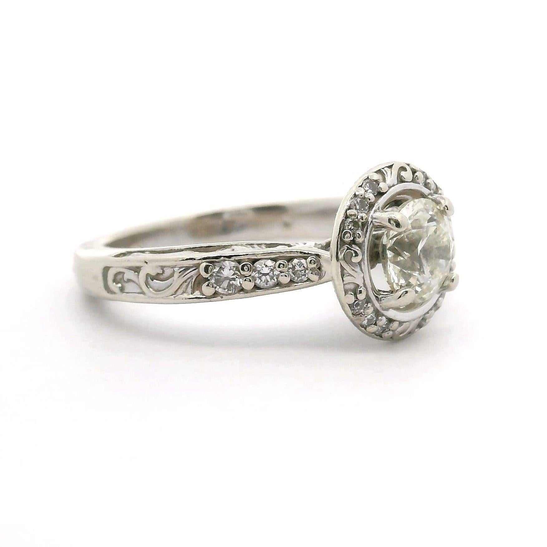 Condition:  Very Good Condition
Metal:  14k Gold (Marked, and Professionally Tested)
Weight:  4.5g
Center Diamond:  Round Cut 0.71ct Natural Diamond
Center Diamond Color and Clarity:  L-M and I1
Accent Diamonds:  Round Cut Diamonds 0.18cttw
Face