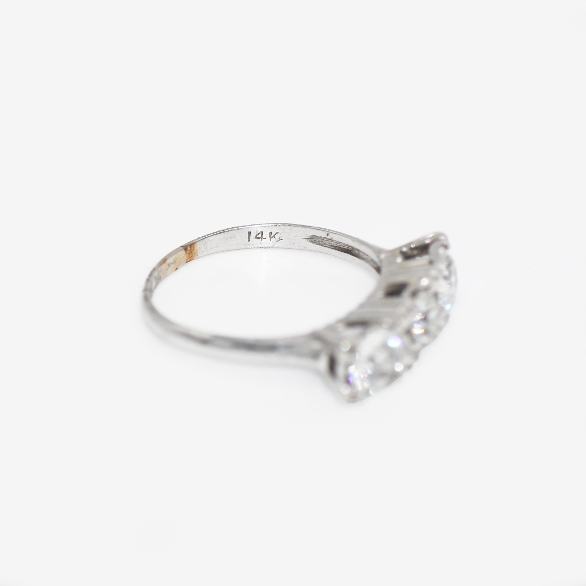Vintage diamond ring in 14k white gold.
Stamped 14k and weighs 2.5 grams.
There are three old-euro cut diamonds, 2 x .40ct , H-I color, Si1-si2 clarity.
Also, one .25ct, H color, Si clarity.
The ring size is 5 3/4 and can be sized.
Excellent