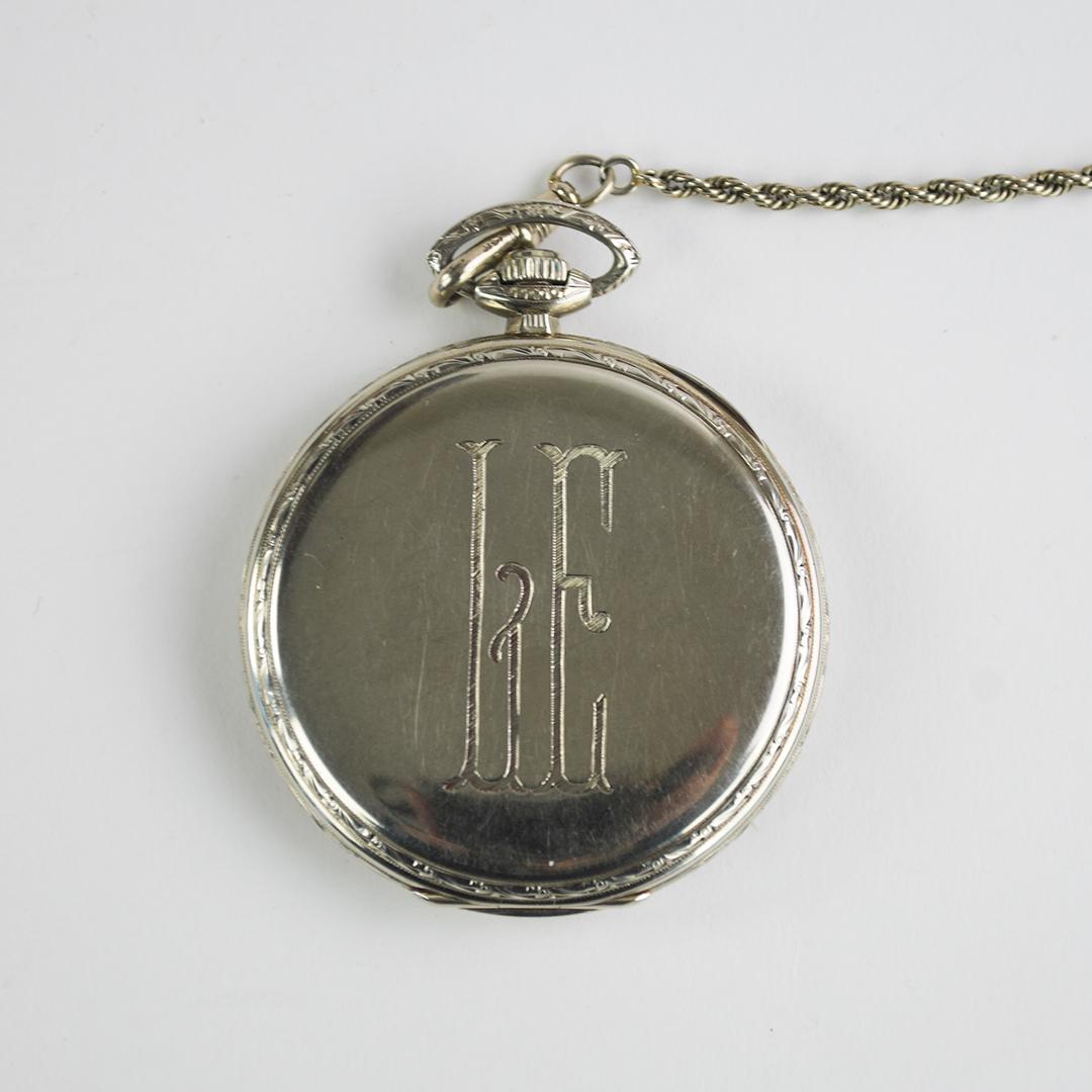 Waltham 14k white gold pocket watch.
Open face, 21 jewel Maximus A movement, adjust 5 positions.
The serial number is 22123260, Model 1918.
The two inner lids are stamped 14k.
The watch weighs 55.5 grams.
The 13k white gold rope chain tests 55% gold