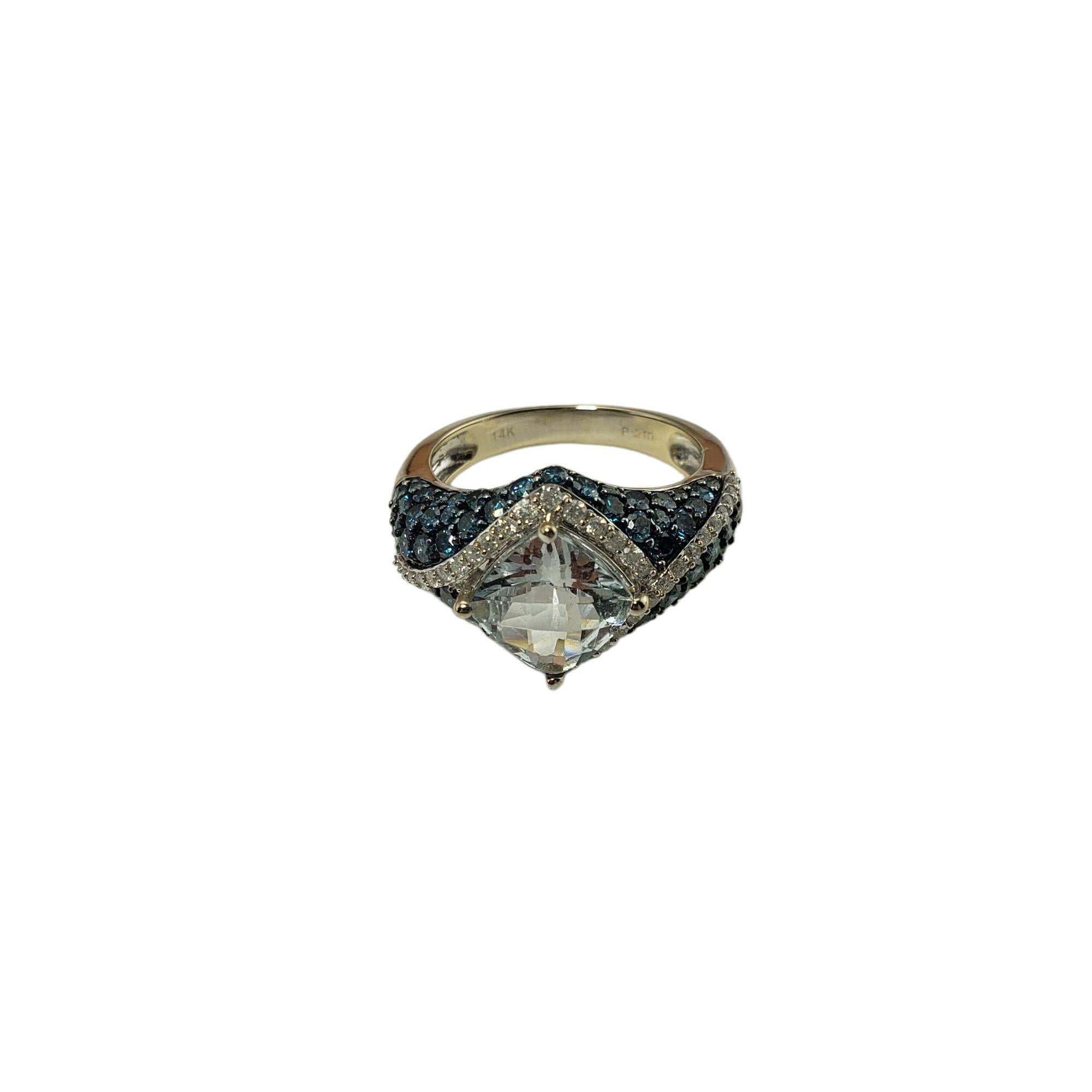 Vintage 14 Karat White Gold White Topaz and Blue and White Diamond Ring Size 7 JAGi Certified-

This lovely ring features one square cushion cut white topaz, 66 blue color enhanced diamonds and 40 round brilliant cut white diamonds set in classic
