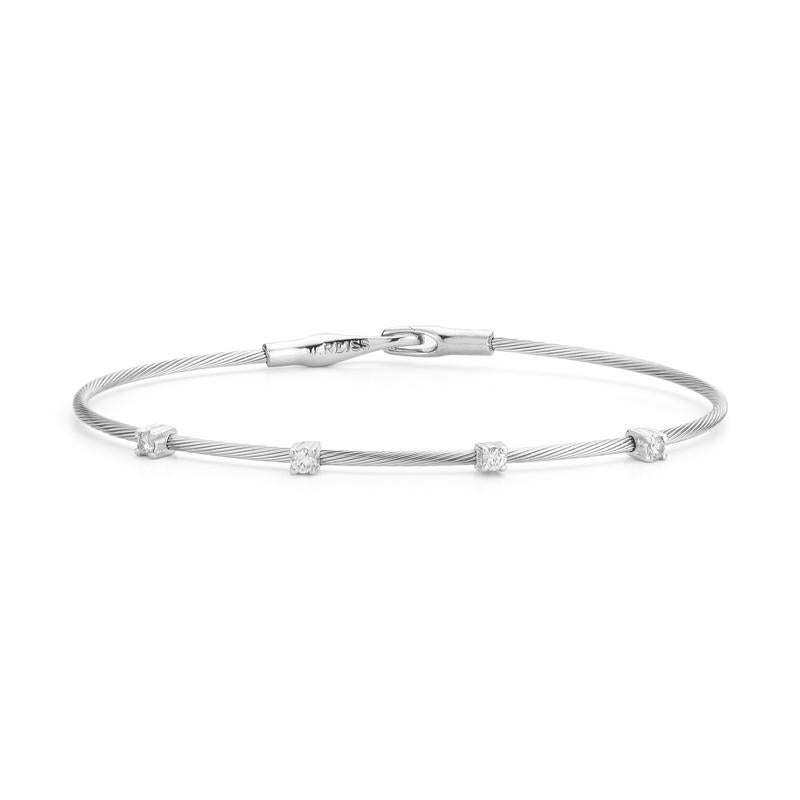 14 Karat White Gold Hand-Crafted Wire Bracelet, Accented with 0.20 Carats of Prong Set Diamonds.
