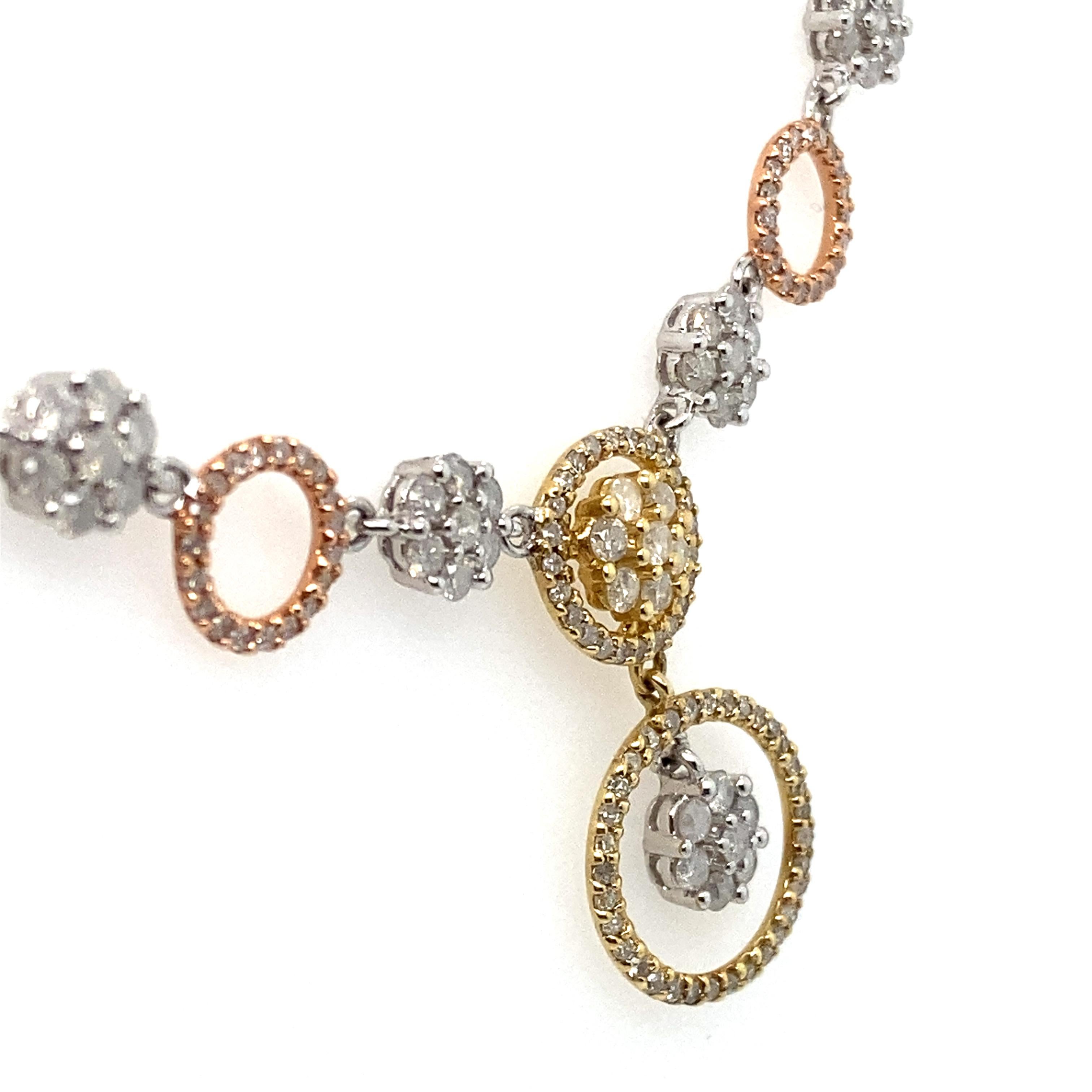 14k White Gold, Yellow Gold and Rose Gold Diamond Circles and Flowers Necklace - The necklace contains 230 round diamonds that weigh approximately 1ct total weight. The diamonds are H - I color, I1 - I3 clarity. 
Length: 17