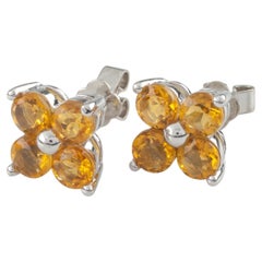 Clous d'oreilles fleur en or blanc 14 carats et saphir jaune 2,0 carats