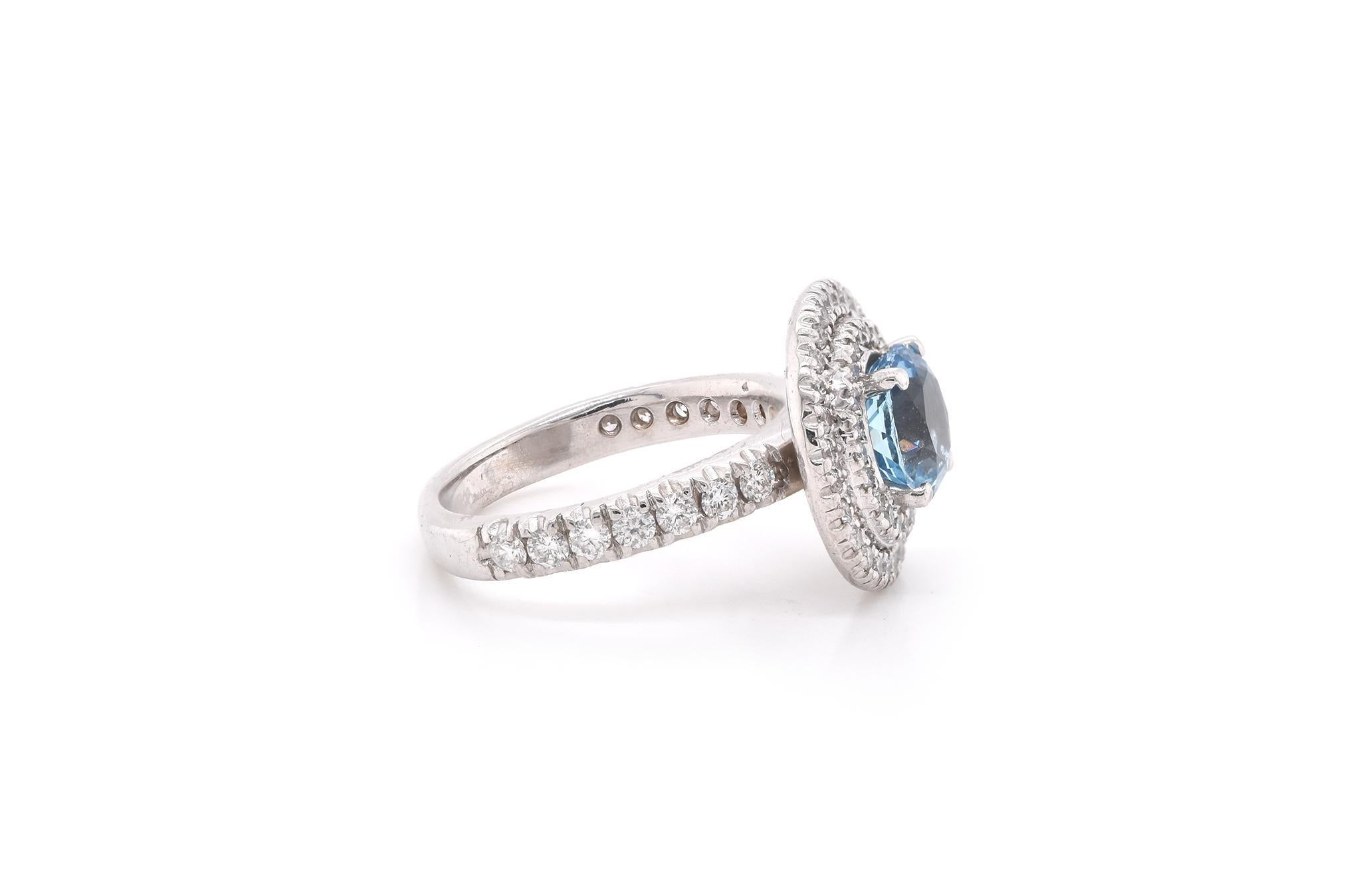 Material: 14k white gold 
Zircon: 1 Round cut = 2.25 ct
Diamonds: 63 rounds = 0.77cttw
Color: G
Clarity: VS2
Ring Size: 4 3/4 (allow up to two additional business days for sizing requests)
Weight: 5.75 grams