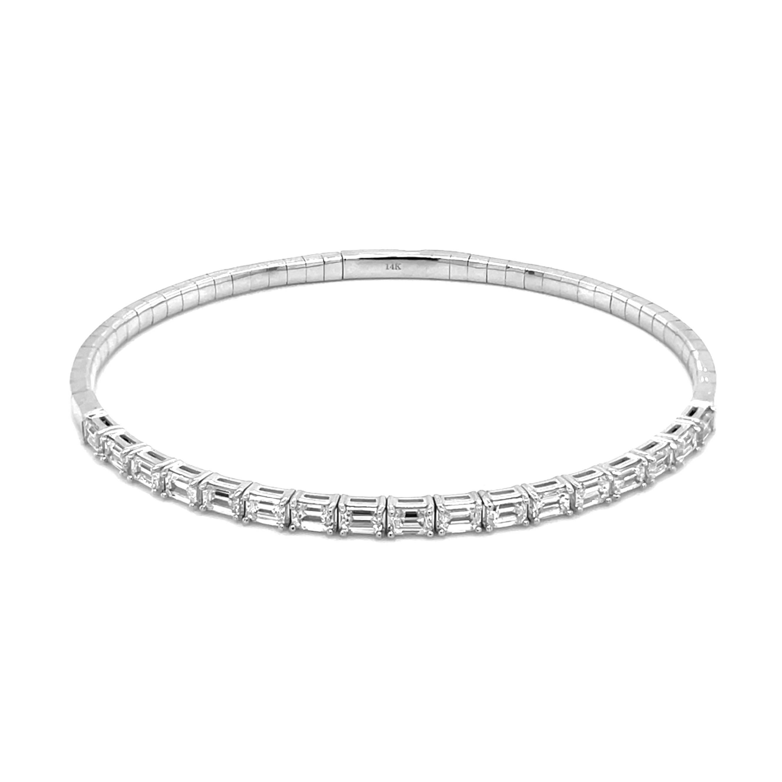 Quality Flexible Bangle: Made from real 14k gold with 17 glittering emerald cut white diamonds approximately 2.26 ct. Certified diamonds, featuring a single row of emerald cut white diamonds flexible diameter for comfort with a color and clarity of