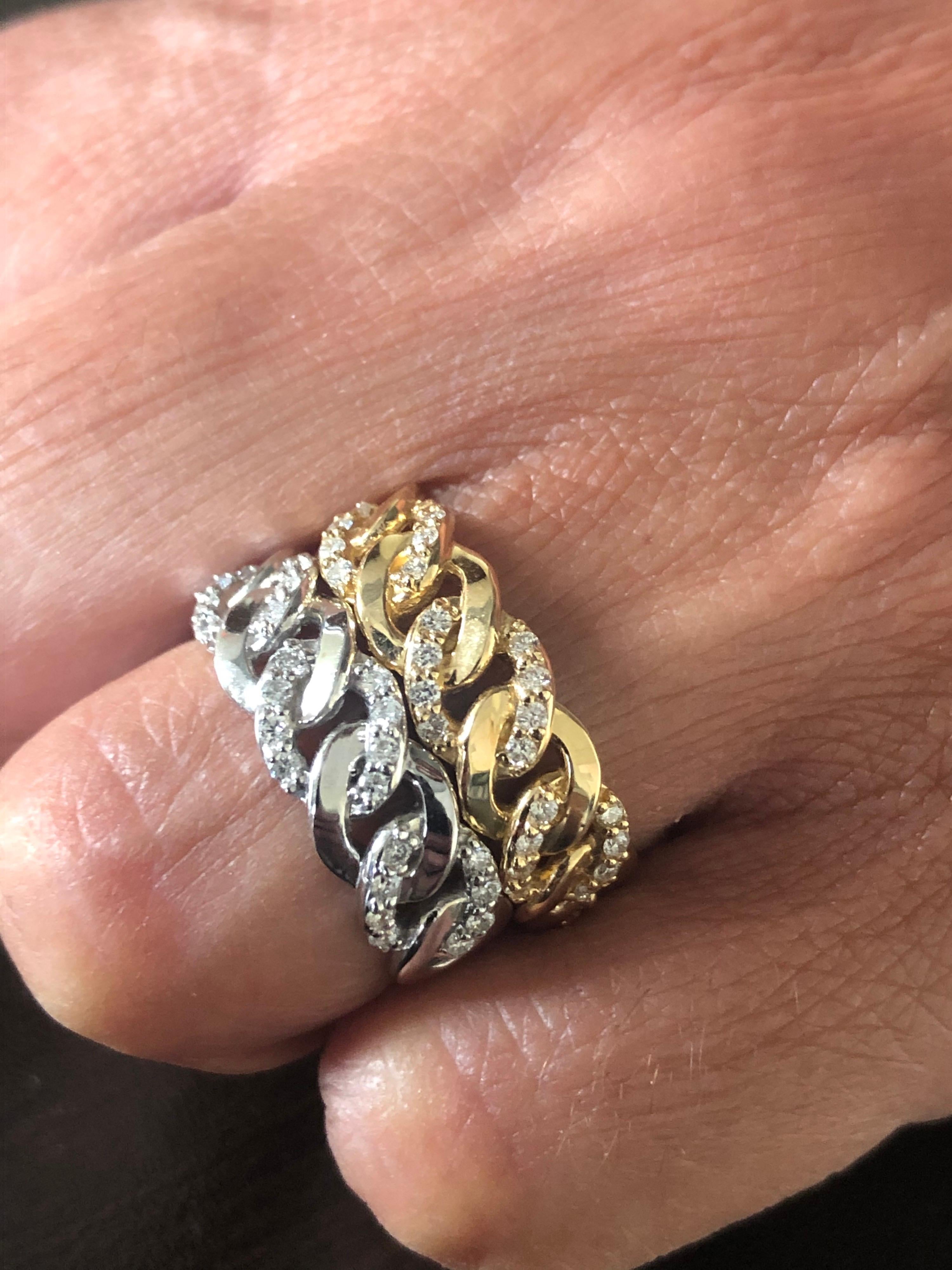 14K white and yellow gold link rings set 3/4 of the way around. Each ring weighs 0.40 Carats. The color of the stones are G, the clarity is SI1. The rings are a size 6.5. The rings are sold as a set.