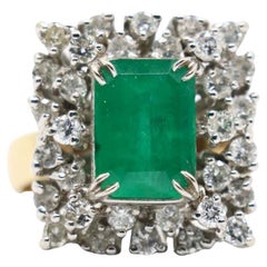 Anillo Diamante Esmeralda Oro Blanco y Amarillo 14K
