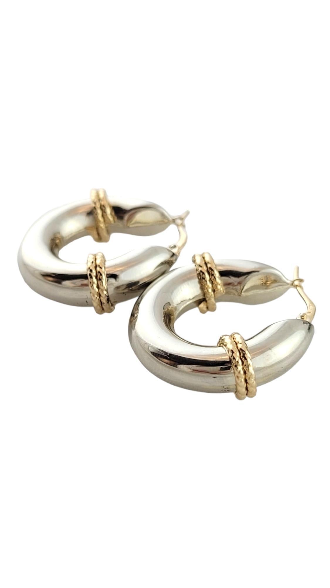 14K White & Yellow Gold Hoops

This gorgeous set of 14K white gold hoops has beautiful yellow gold detailing for a stunning finish!

Diameter: 26.04mm / 1.25