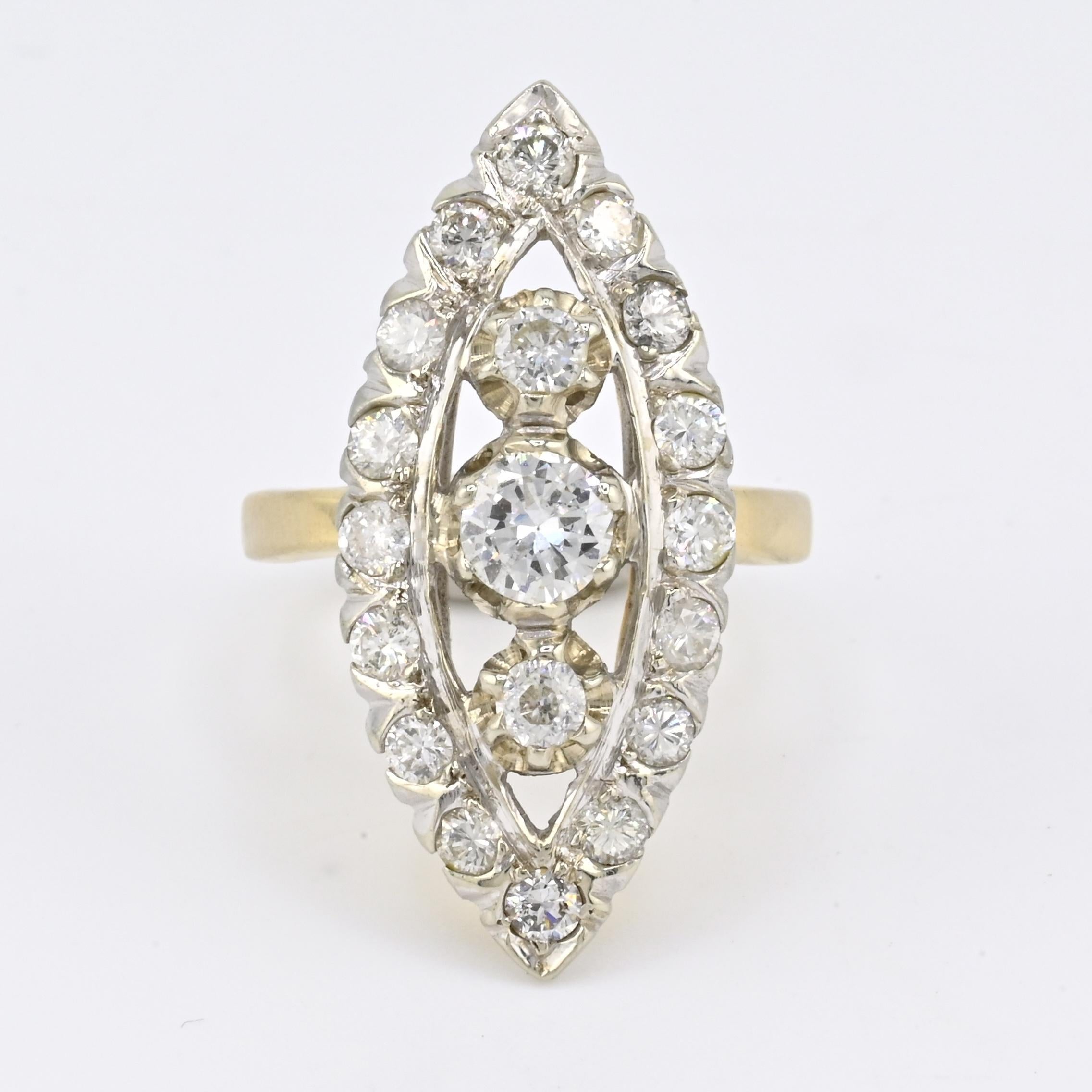 This elegant two-tone ring, crafted from 14K white and yellow gold, features a brilliant display of natural diamonds totaling approximately 1.67 carats. At its center is a single round brilliant-cut diamond weighing 0.50 carats, near colorless grade