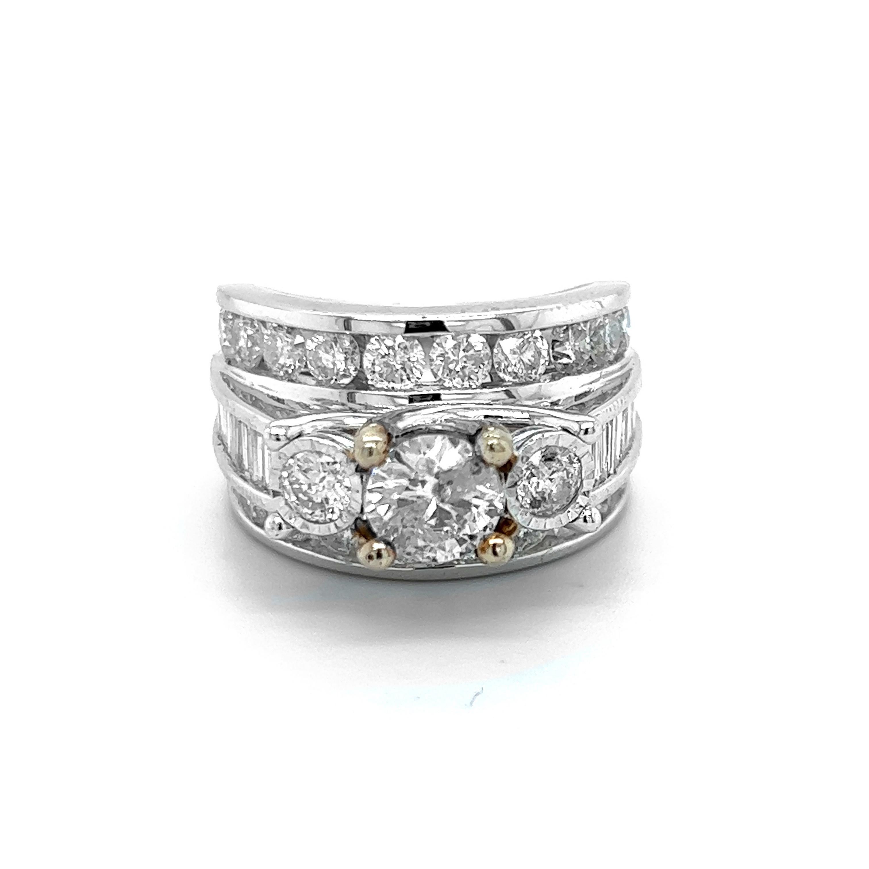 14K White Yellow Gold Round and Baugette Diamonds Cocktail Ring

Diamonds weigh apprx. 4.80 ct. Diamonds range from H, I, J color, SI1-I2 clarity.

Center diamond is apprx. 1 carat with two 0.40ct. diamonds on each side.

Baguette diamonds are set