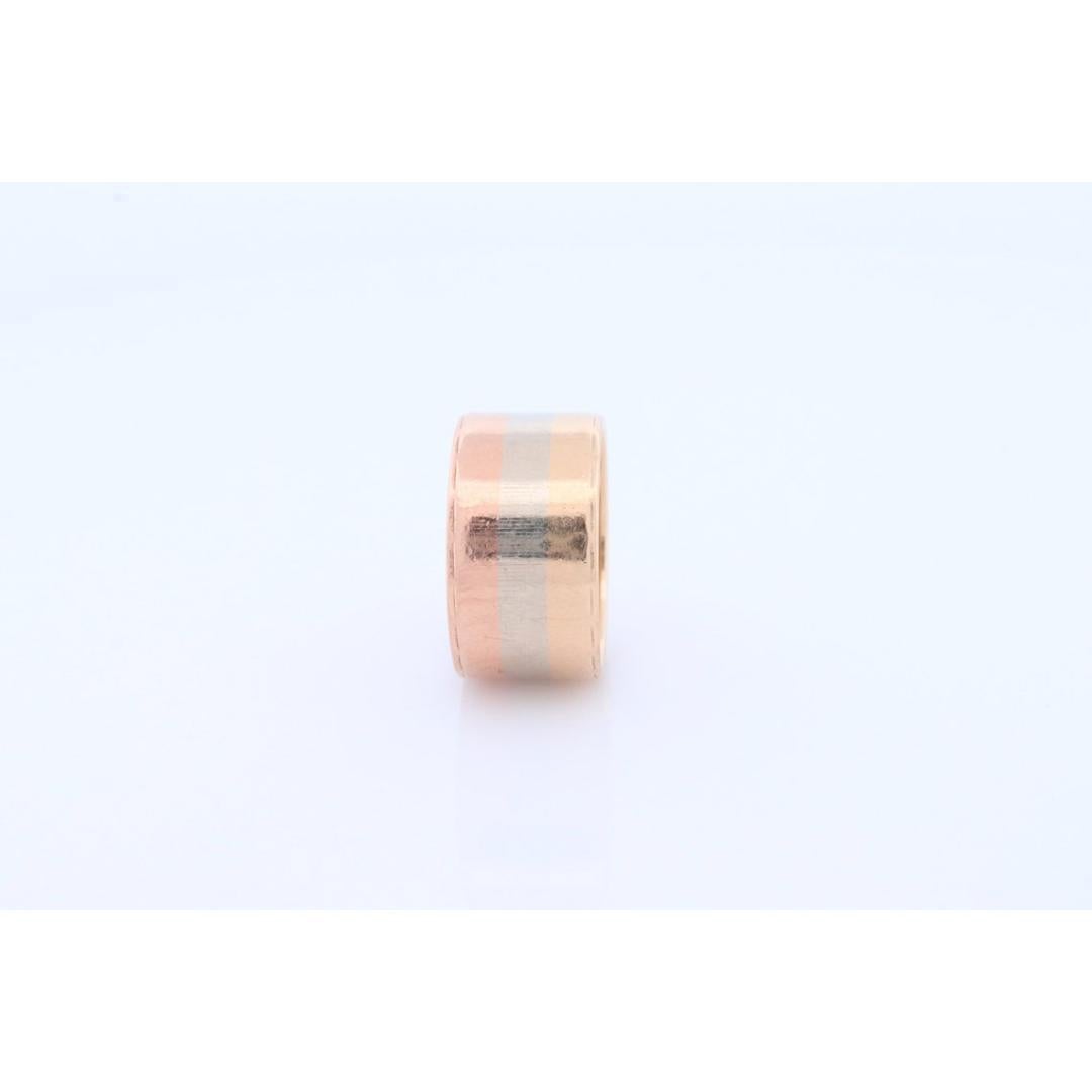 Vintage from the 1980s
Size: 6 US
Materials: Gold
Band color: Rose gold
Adjustable

Style: Art deco

Beautiful Vintage 14k 10mm wide wedding/cigar band. These are getting harder to come by. Can be used as a stackable ring.

Wonderful TriColor