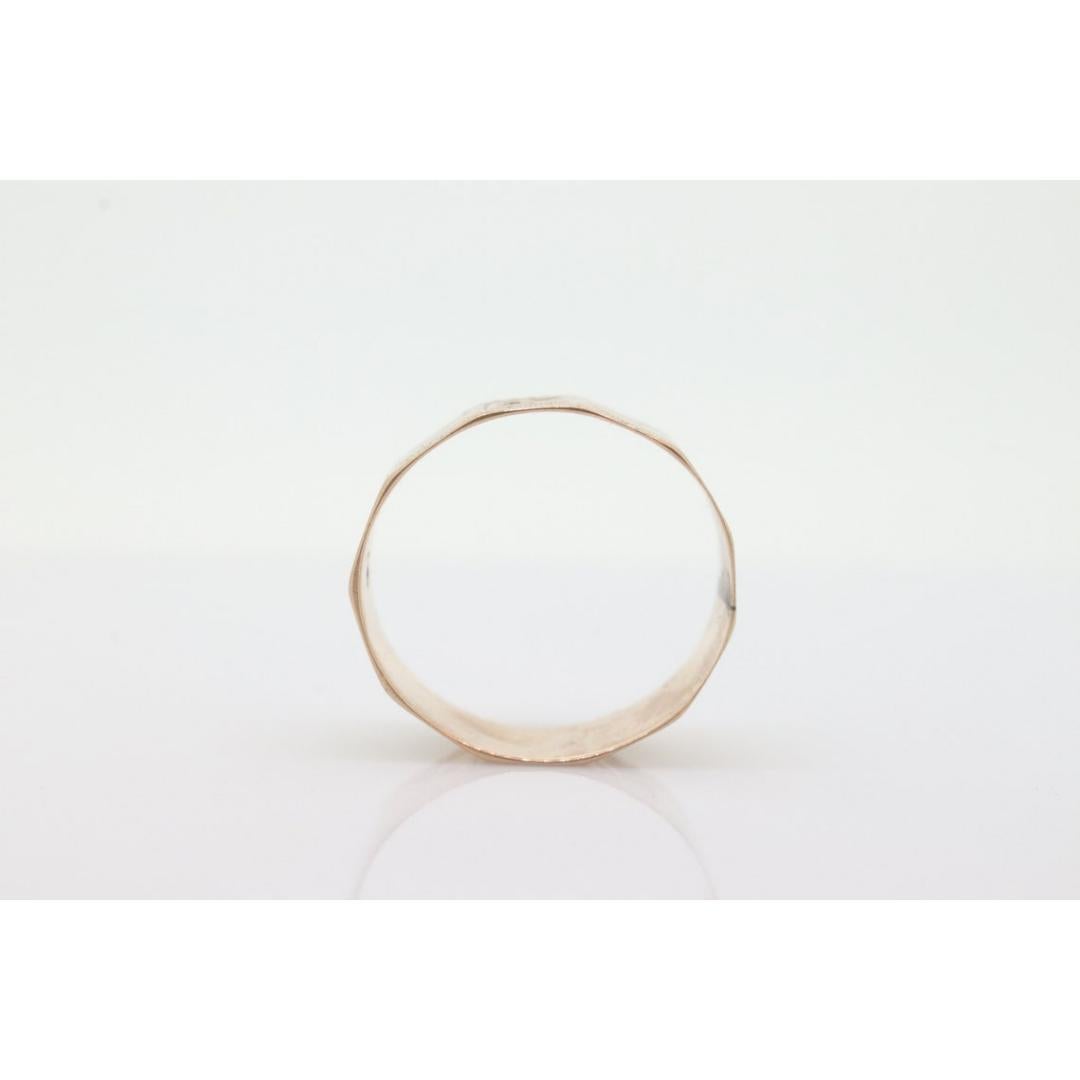 Vintage from the 1920s
Size: 4 US
Materials: Gold
Band color: Rose gold
Adjustable

Style: Art deco

Beautiful Vintage 14k 5mm wide wedding/cigar band. These are getting harder to come by. Can be used as a stackable ring.

Very intricate and