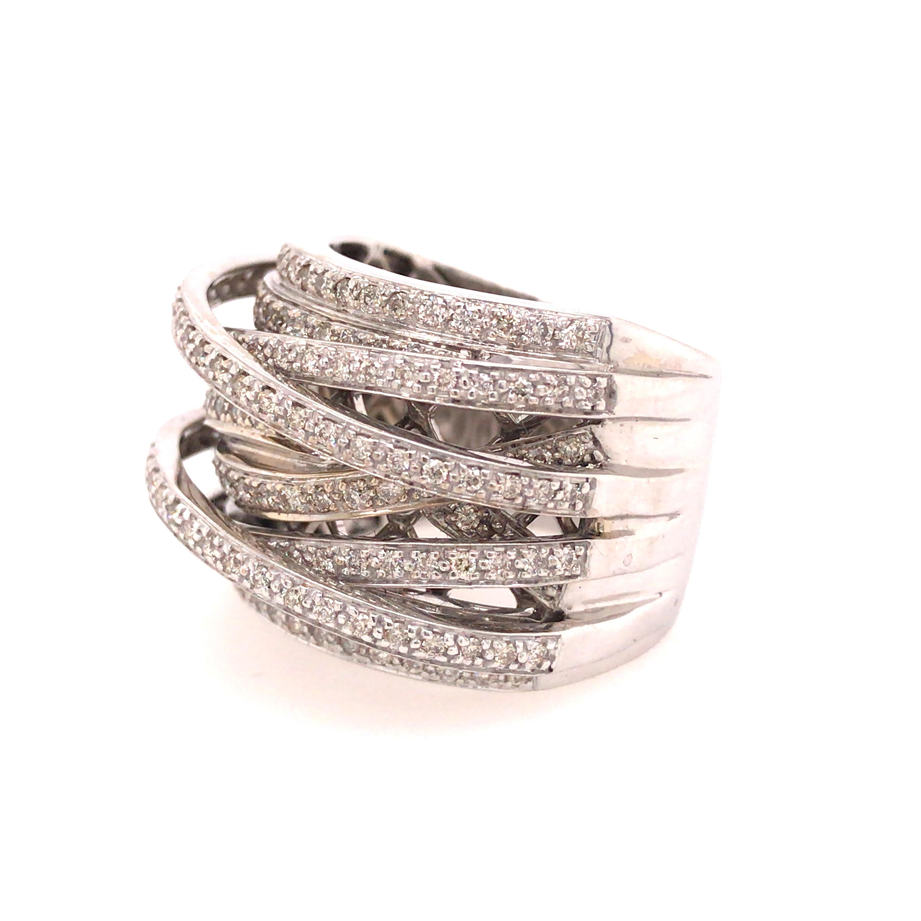 Wide Multi-Row Diamond Band in 14K White Gold.  Round Brilliant Cut Diamonds weighing 1.60 carat total weight, G-H in color and VS-SI in clarity are expertly set.  The Ring measures 3/4 inch in width and 5/16 inch in height.  Ring size 9 1/2. 21.77