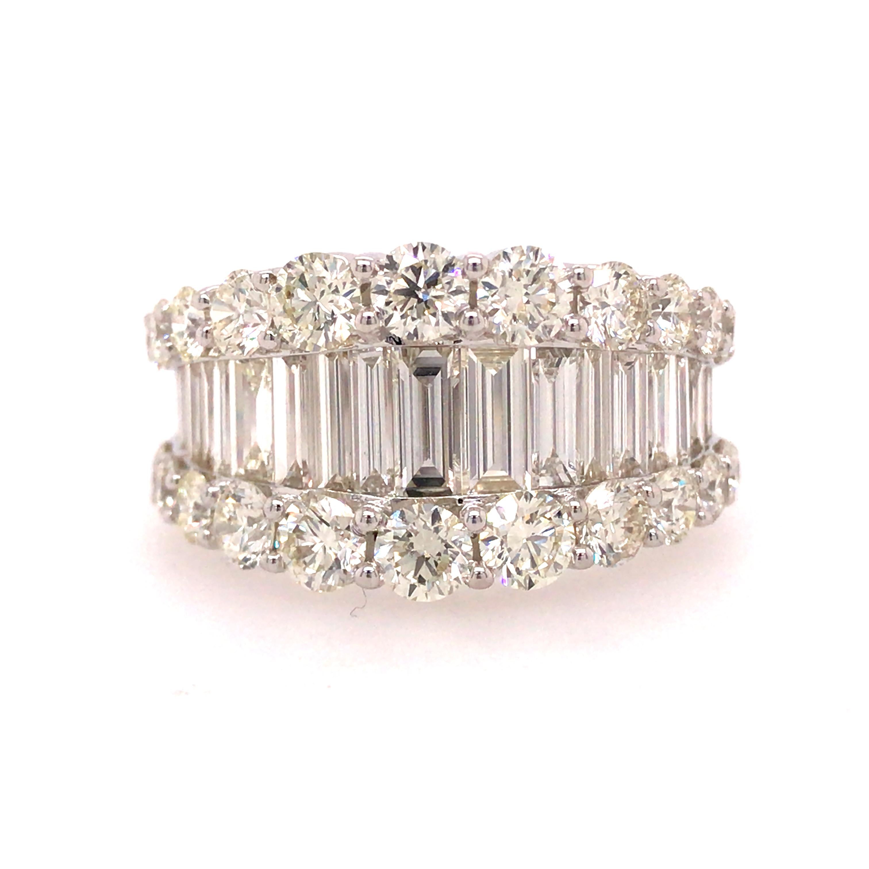 Wide Round and Baguette Diamond Band in 14K White Gold.  Round Brilliant Cut and Baguette diamonds weighing 4.88 carat total weight, G-I in color and VS in clarity are expertly set.  The Band measures 1/2 inch in width at the widest point.  Ring