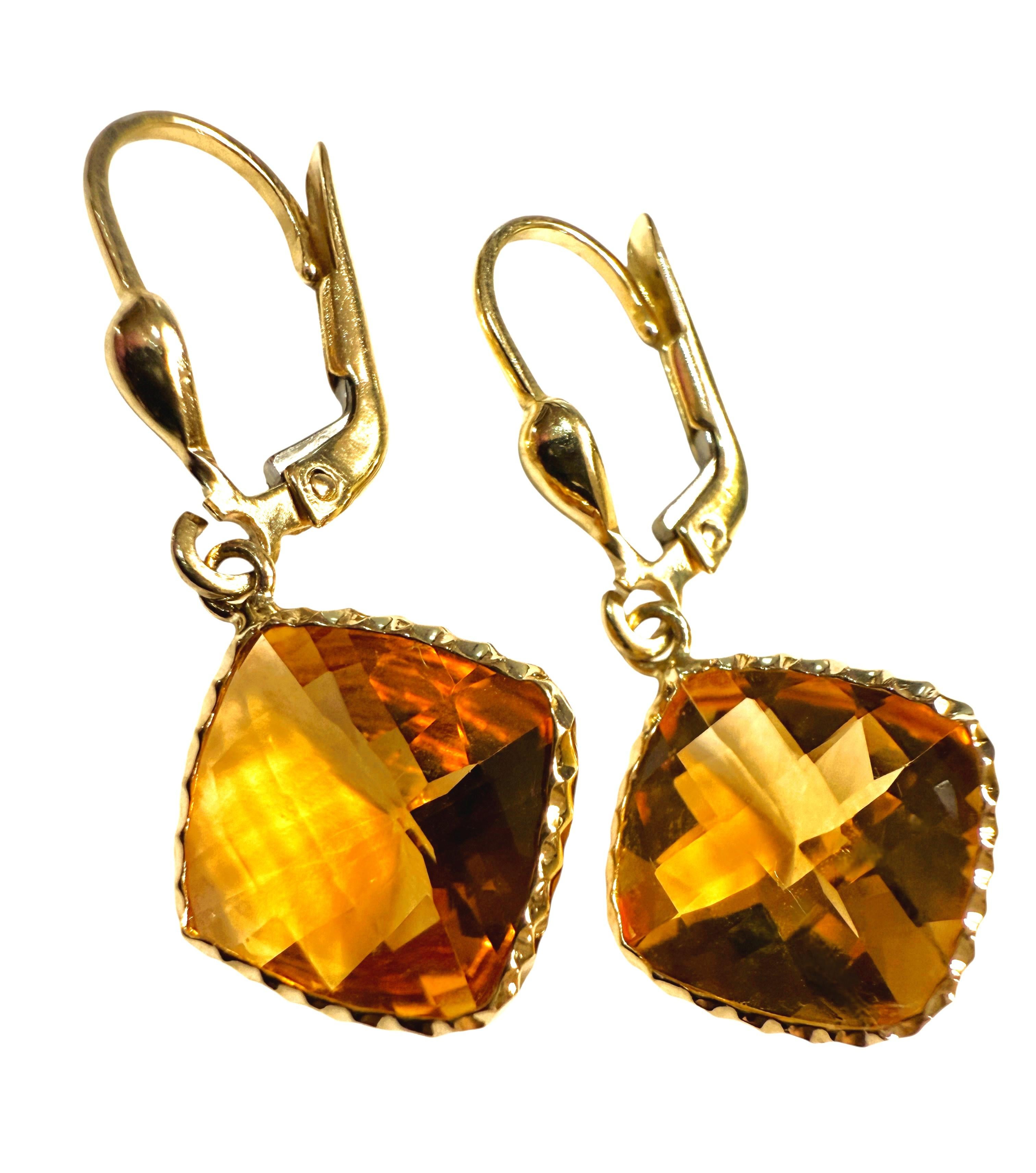 The stones are so beautifully cut and exquisite. They are Golden Yellow Citrine stones and are 5.25 carats each.  They measure 10.5 x 10.5 x 6.4 mm. The setting is has a diamond cut border around the stones.  It's a beautiful setting.  They are