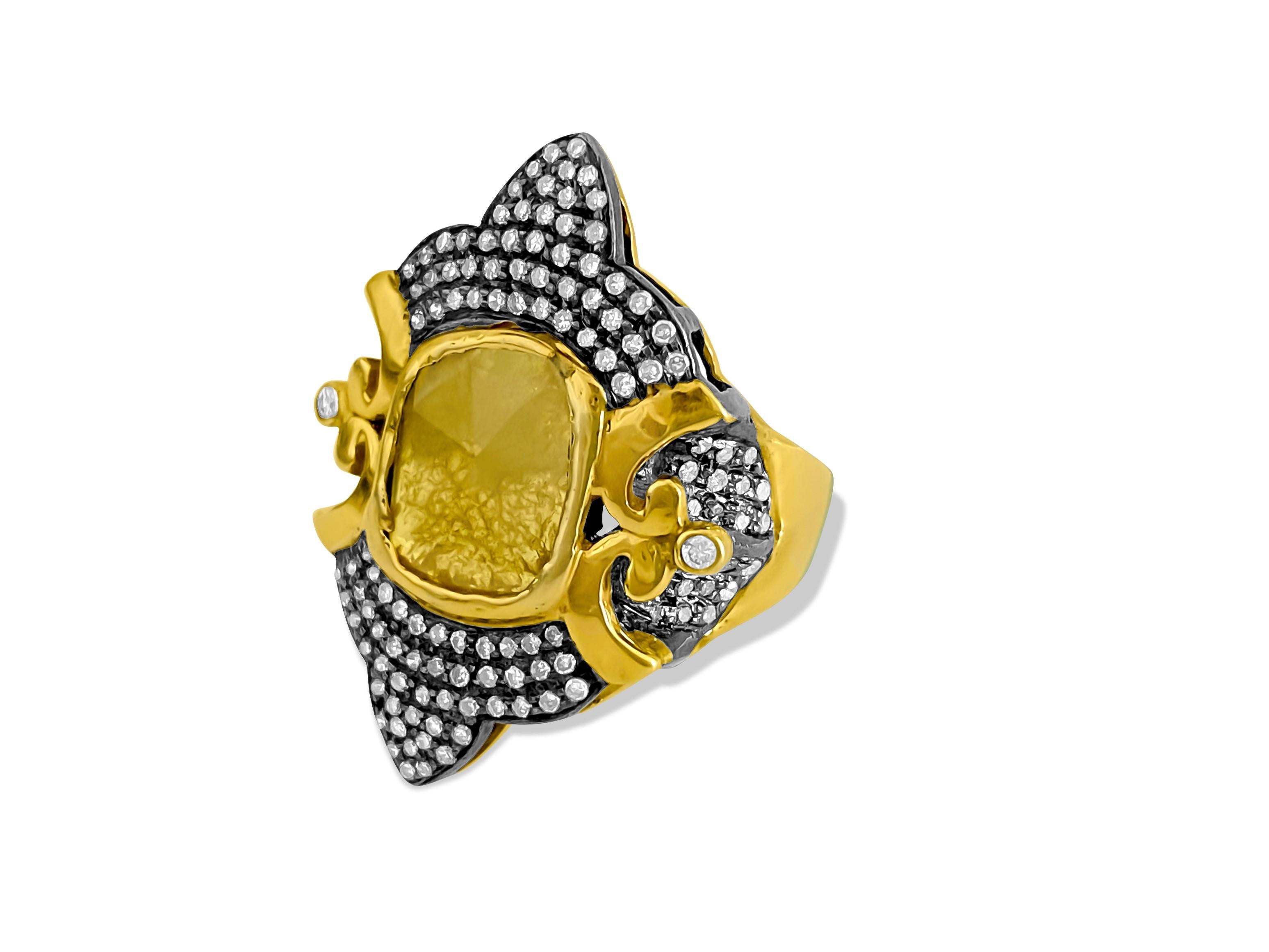 Crafted from a striking combination of 14K yellow and black gold, this exceptional ring features a captivating 2.00-carat fancy yellow diamond at its center, boasting a slice cut for added allure. Complementing the centerpiece are side diamonds