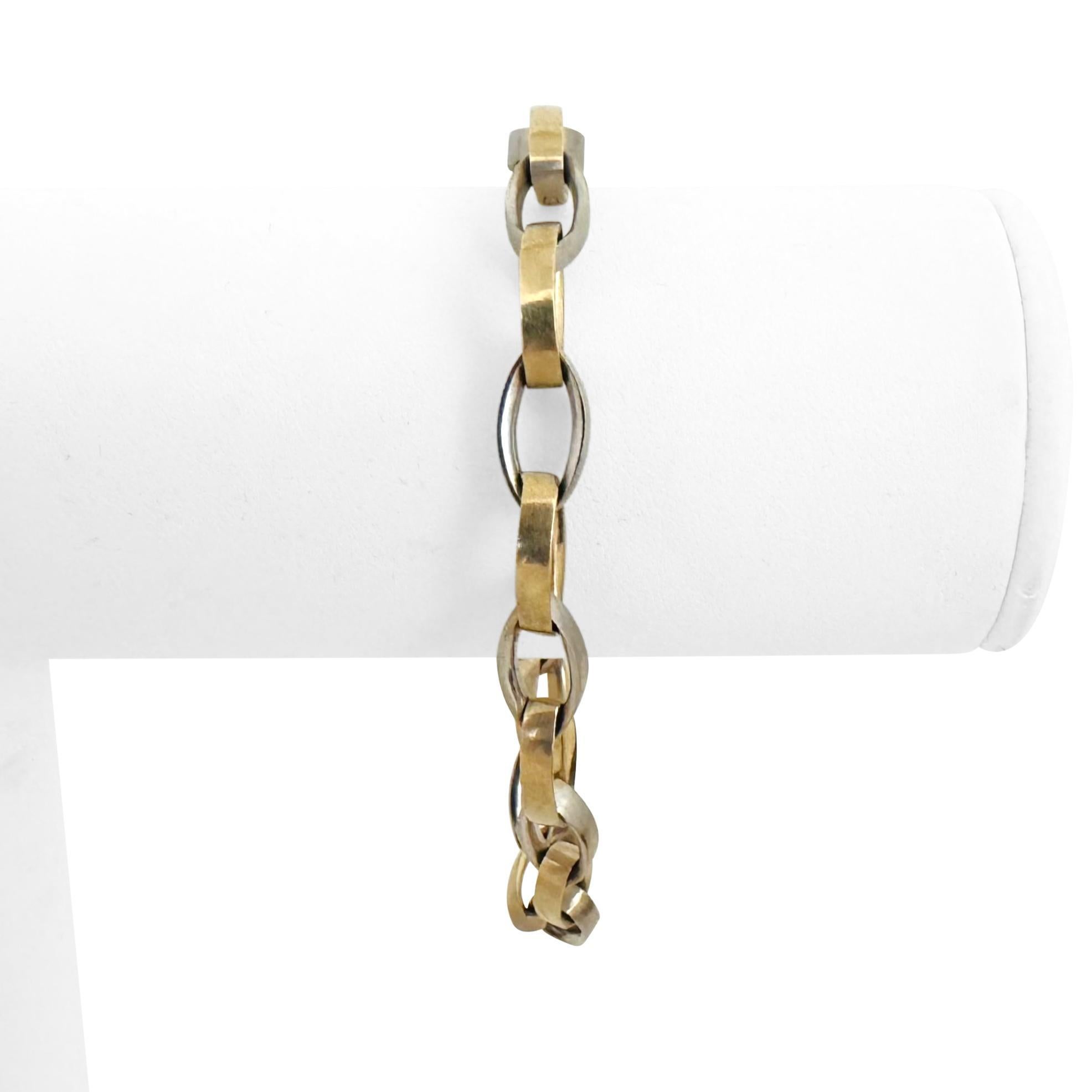 Condition:  Excellent Condition, Professionally Cleaned and Polished
Metal:  14k Gold (Marked, and Professionally Tested)
Weight:  18.9g
Length:  7.5 Inches
Width:  7mm
Closure:  Snap Latch
Markings:  