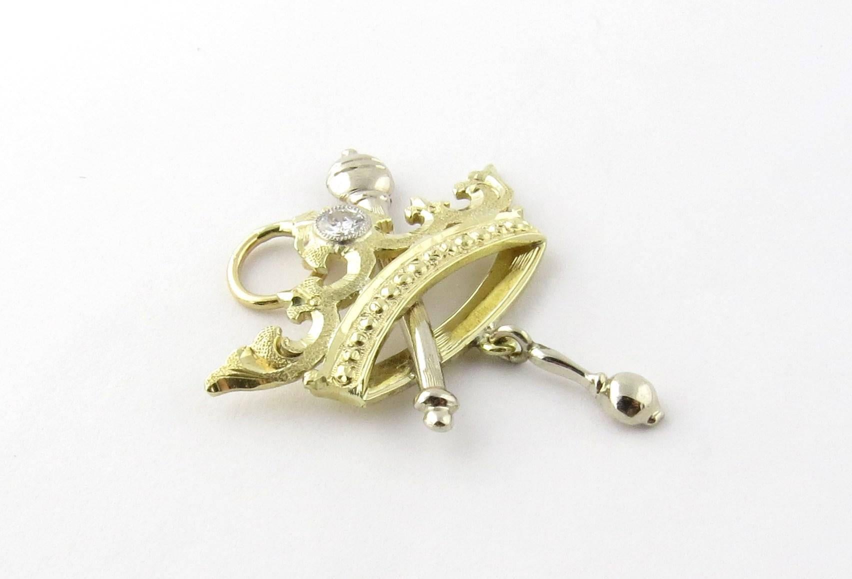 Vintage 14K Yellow and White Gold 1928 Crown, Scepter and Gavel Diamond Pendant Charm O.E.S 

O.E.S. is Order of the Eastern Star 

This regal Crown pendant has a round brilliant diamond at its top that shines along with the gold of the crown. 

The