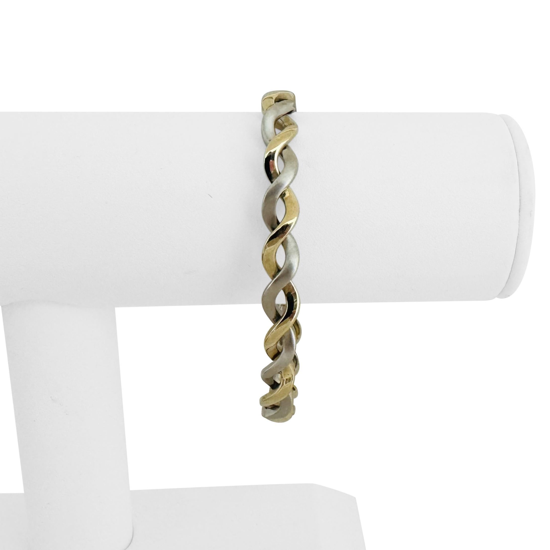 Condition:  Excellent Condition, Professionally Cleaned and Polished
Metal:  14k Gold (Marked, and Professionally Tested)
Weight:   20.1g
Length:  7 Inches Inner Circumference
Width:  6mm
Closure:  Box Tab Insert with Safety Latch
Markings:  
