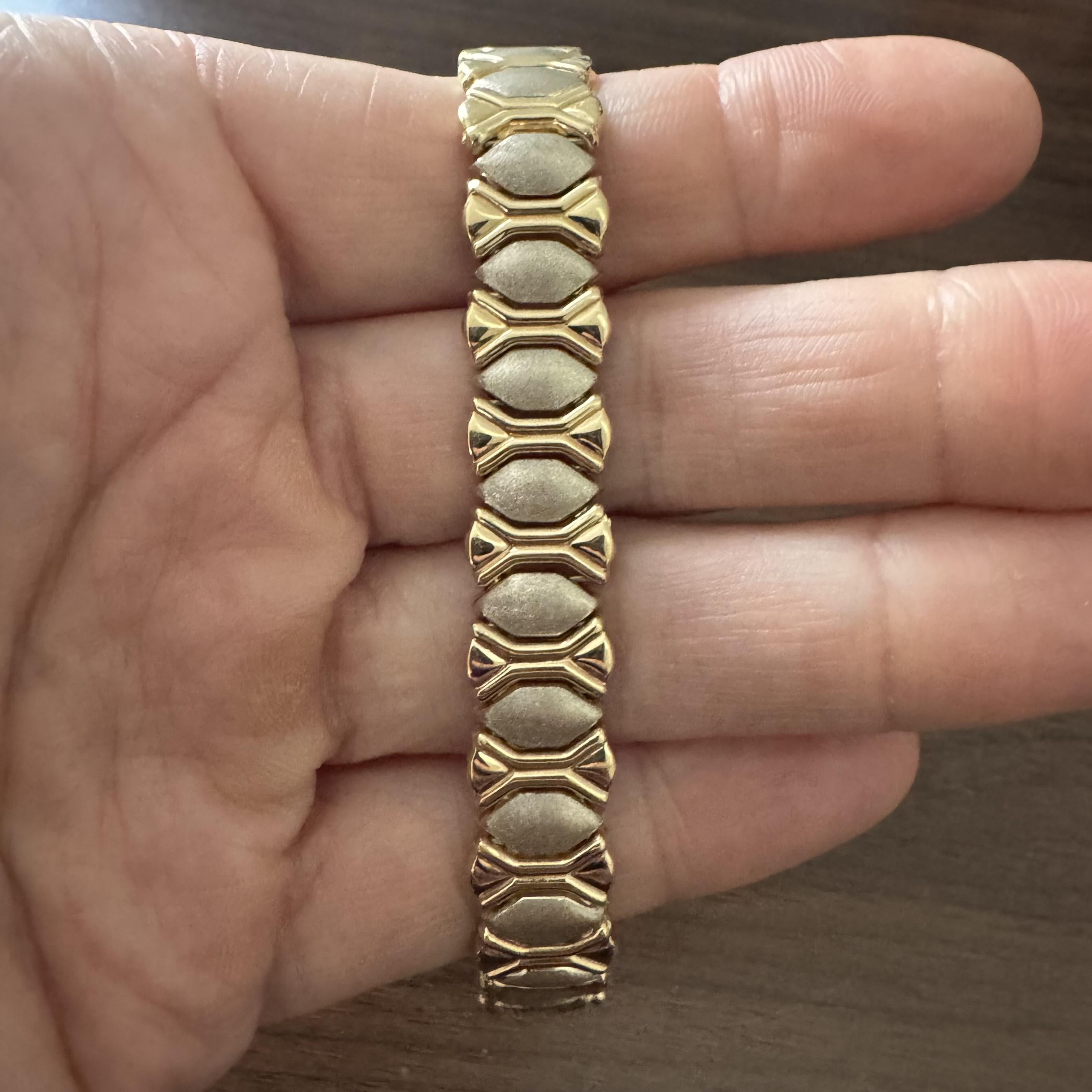 Condition:  Excellent Condition, Professionally Cleaned and Polished
Metal:  14k Gold (Marked, and Professionally Tested)
Weight:  24.8g
Length:  7.25 Inches
Width:  13mm
Closure:  Box Tab Insert with Safety Latch
Markings:  