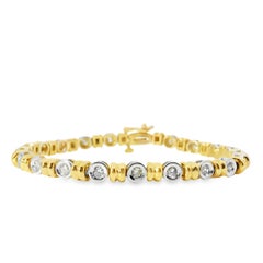 Bracciale tennis in oro giallo e bianco 14k con 2 carati di diamanti