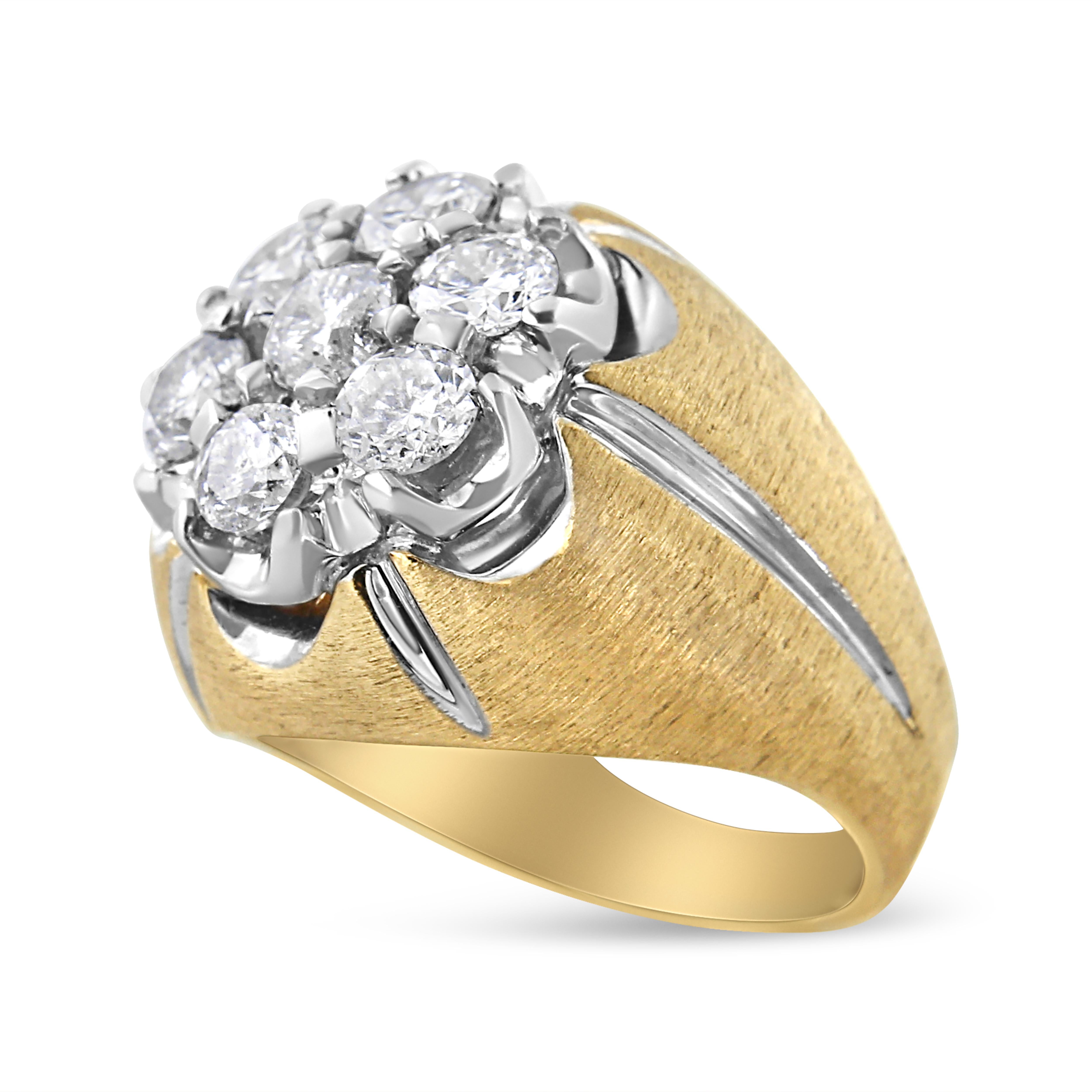 Bold and classic, this 14k yellow gold cluster band is set with 7 natural, round-cut diamonds in a strong prong setting. This yellow gold band has streaks of white gold coming down from the 3 carat cluster of diamonds at the center. The ring