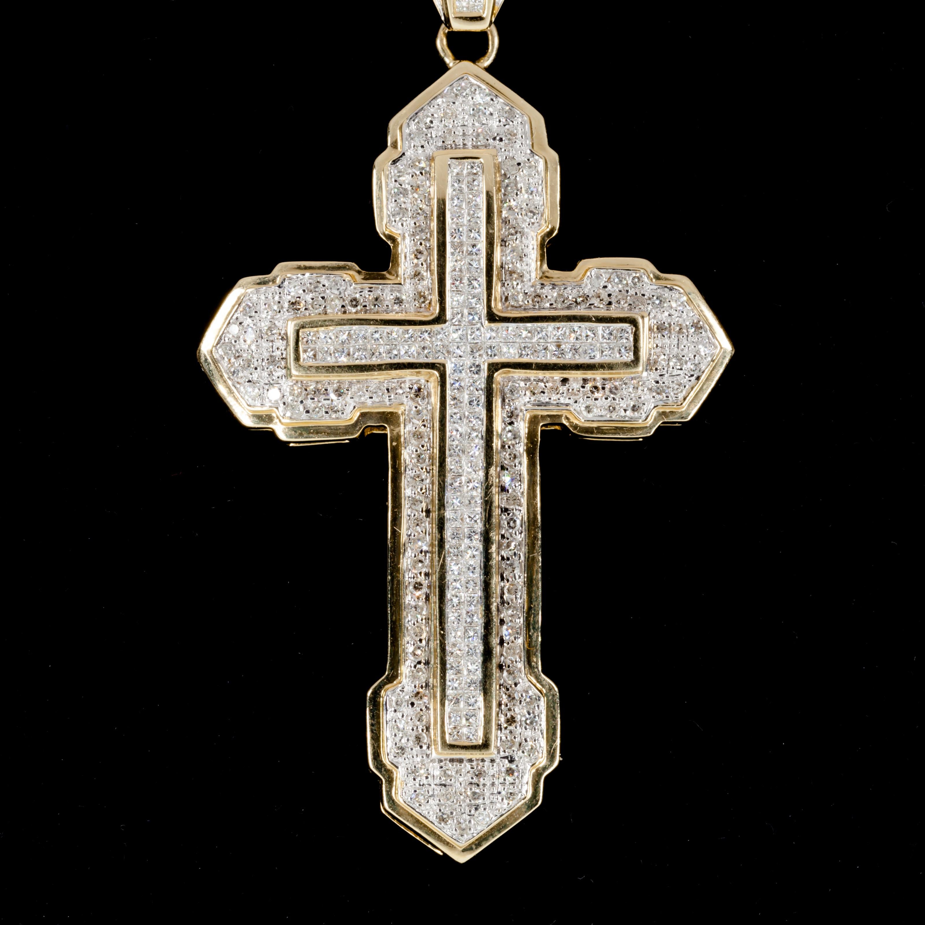 Beautiful Diamond Cross Pendant in 14k White and Yellow Gold
Features Princess Cut Invisible Set Interior Plaque with Round Pave Borders
Delicate 14k Yellow Gold Gallery
Total Diamond Weight = Approximately 6 carats
Average Color = G - H
Average