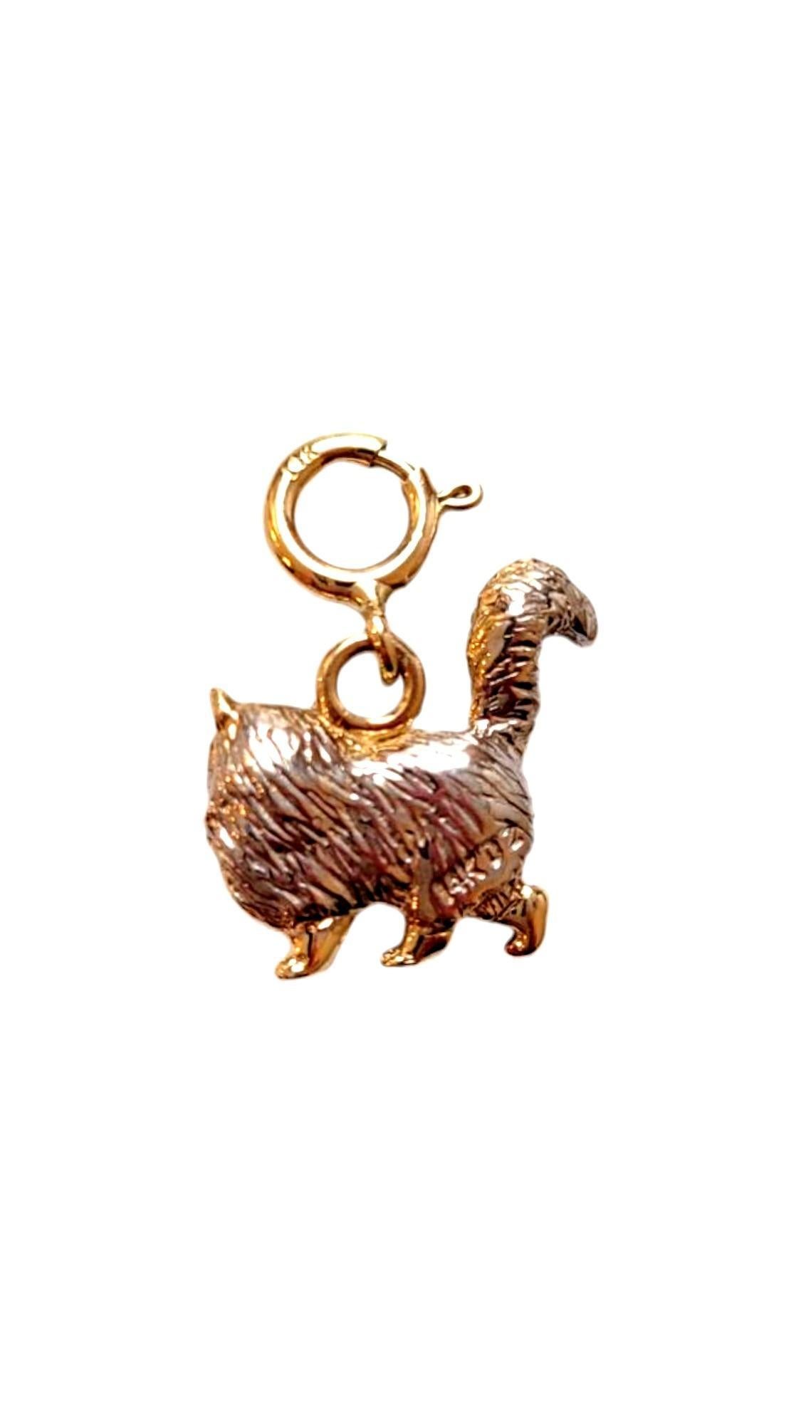 14K Yellow and White Gold Cat Charm

This adorable cat charm showcases playful detailing and a sleek design, capturing the elegance and curiosity of our feline friends. With its polished finish, it adds a whimsical and cute touch to any bracelet or