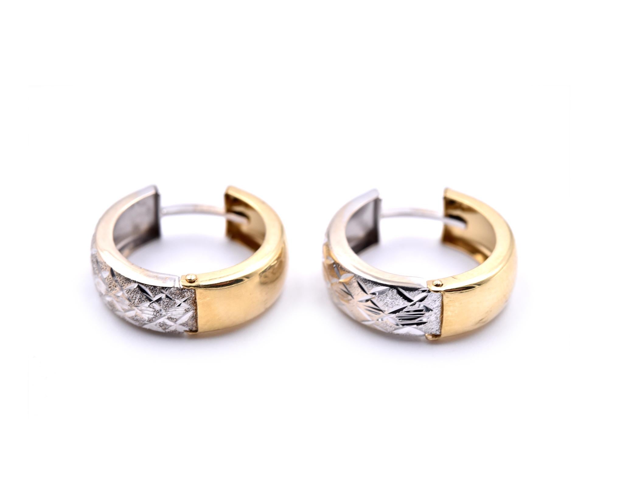 Designer: custom design
Material: 14k yellow and white gold
Dimensions: earrings are 14.48mm by 16.75mm
Fastenings: huggie
Weight: 2.12 grams
