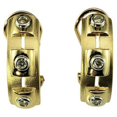 Orecchini a cerchio Omega Back con diamante in oro giallo e bianco 14K #23118