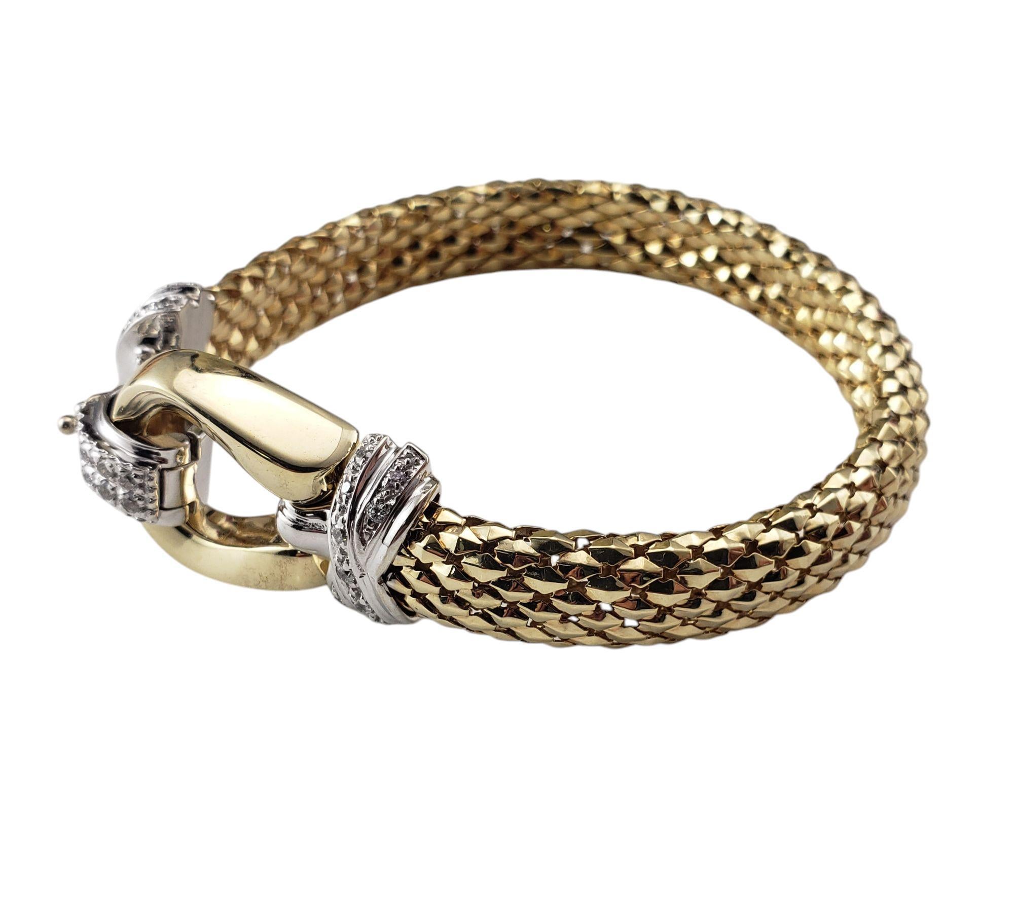 14K Yellow and White Gold Diamond Woven Popcorn Buckle Bracelet-

This 14K yellow and white gold bracelet is a stunning blend of texture and brilliance. Featuring a woven, beaded design that creates a soft yet bold look, this bracelet is both