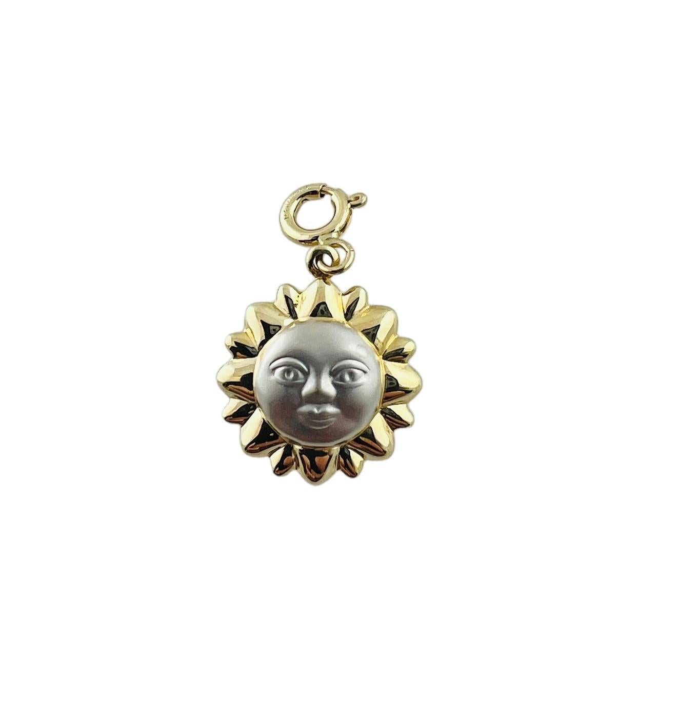 14K Yellow and White Gold Sun Face Charm

This bright charm features a smiling face in white gold on both sides set in yellow gold sun rays.

Charm measures approx. 18.5 mm x 16.3 mm x 5.7 mm and comes on a spring ring

1.1 grams / 0.7 dwt

Stamped