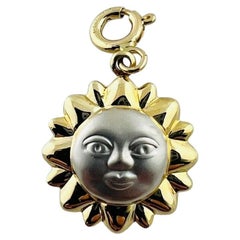 Charme Sun Face n° 15549 en or jaune et blanc 14 carats