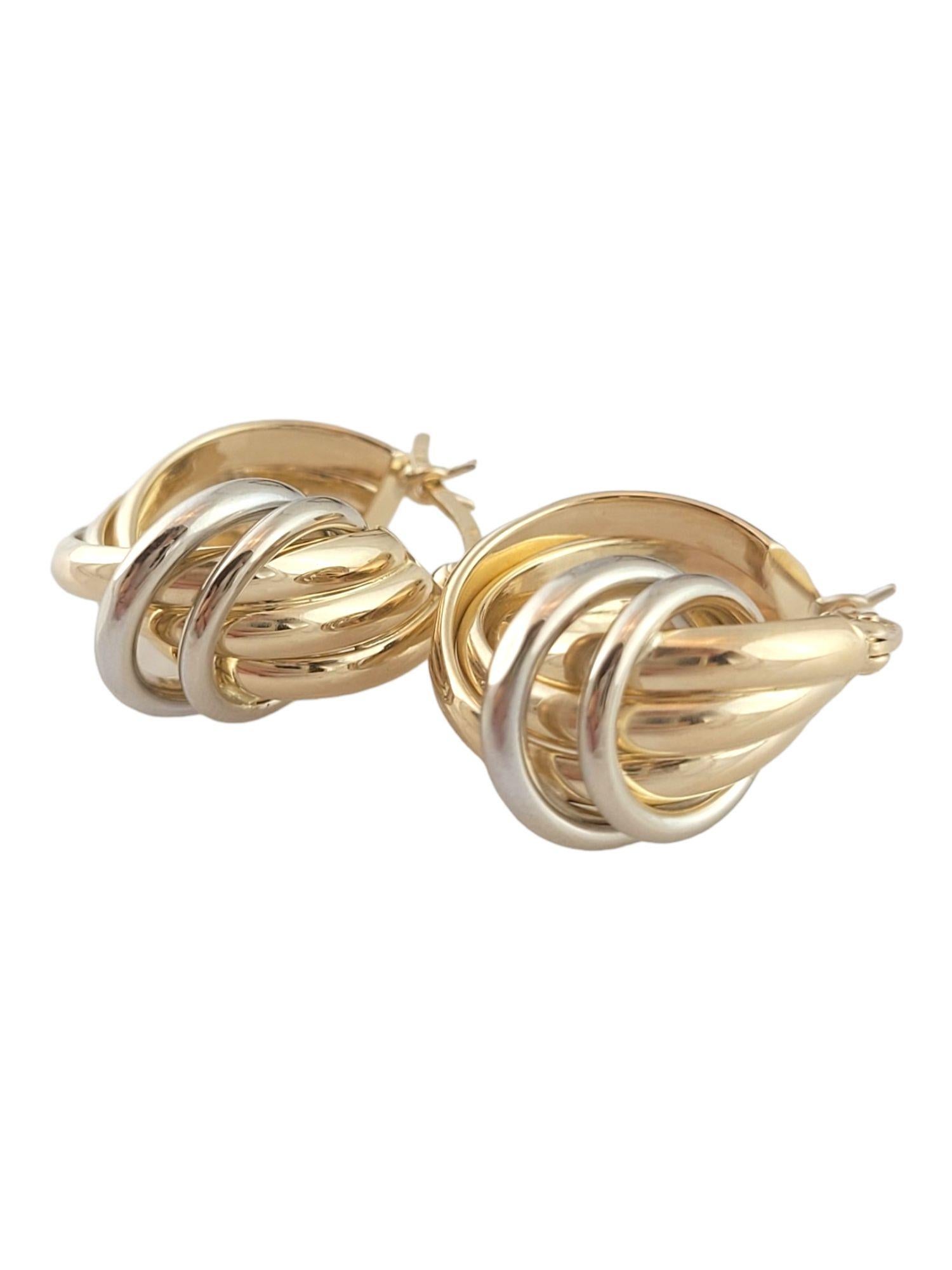Gorgeous set of knot twisted hoops crafted from 14K white and yellow gold!

Size: 20.4mm X 17.4mm X 12.0mm

Weight: 4.25 g/ 2.7 dwt

Hallmark: ISRAEL 14K

Very good condition, professionally polished.

Will come packaged in a gift box or pouch (when
