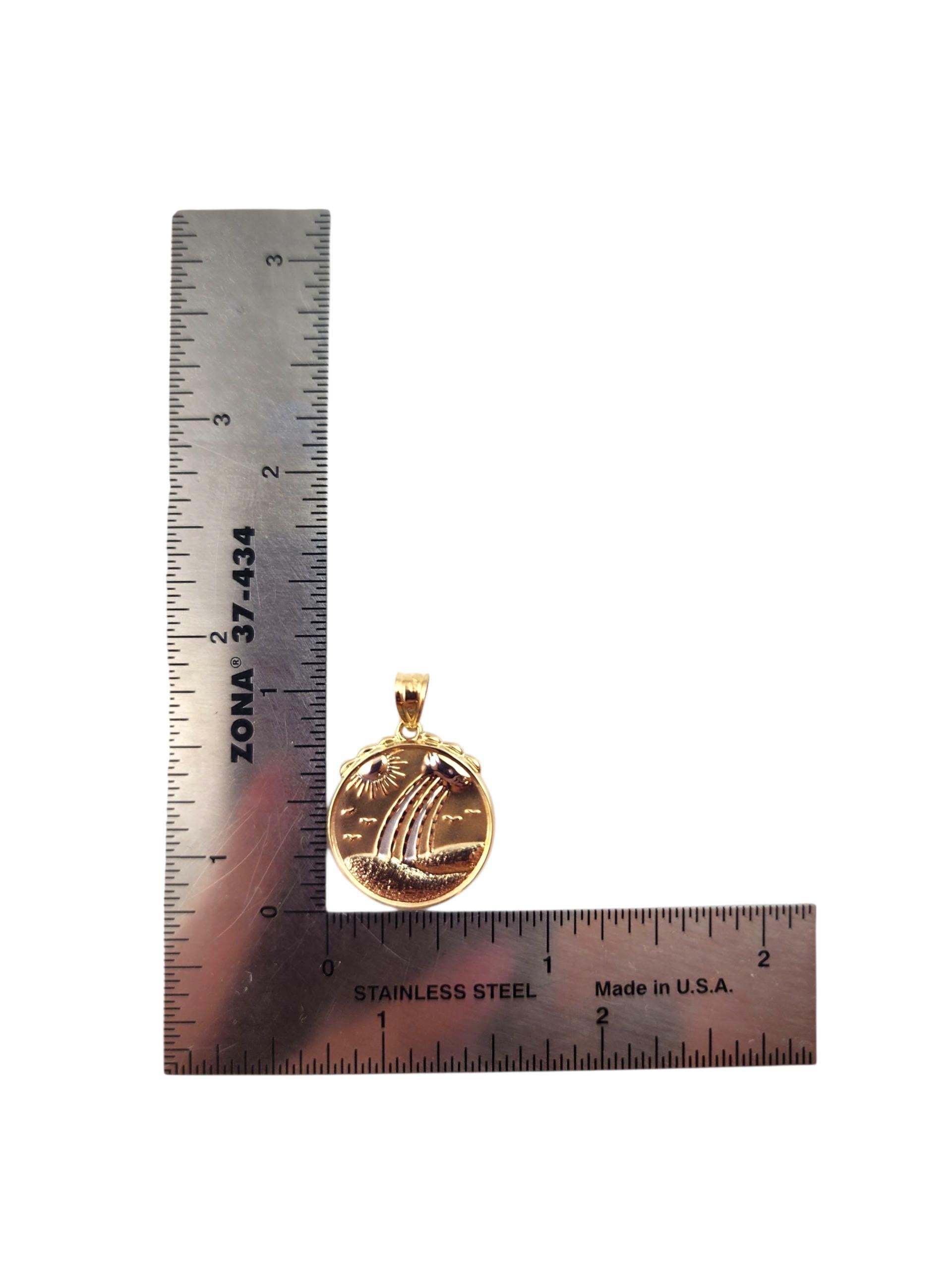 Ciondolo in oro giallo e bianco 14K 
