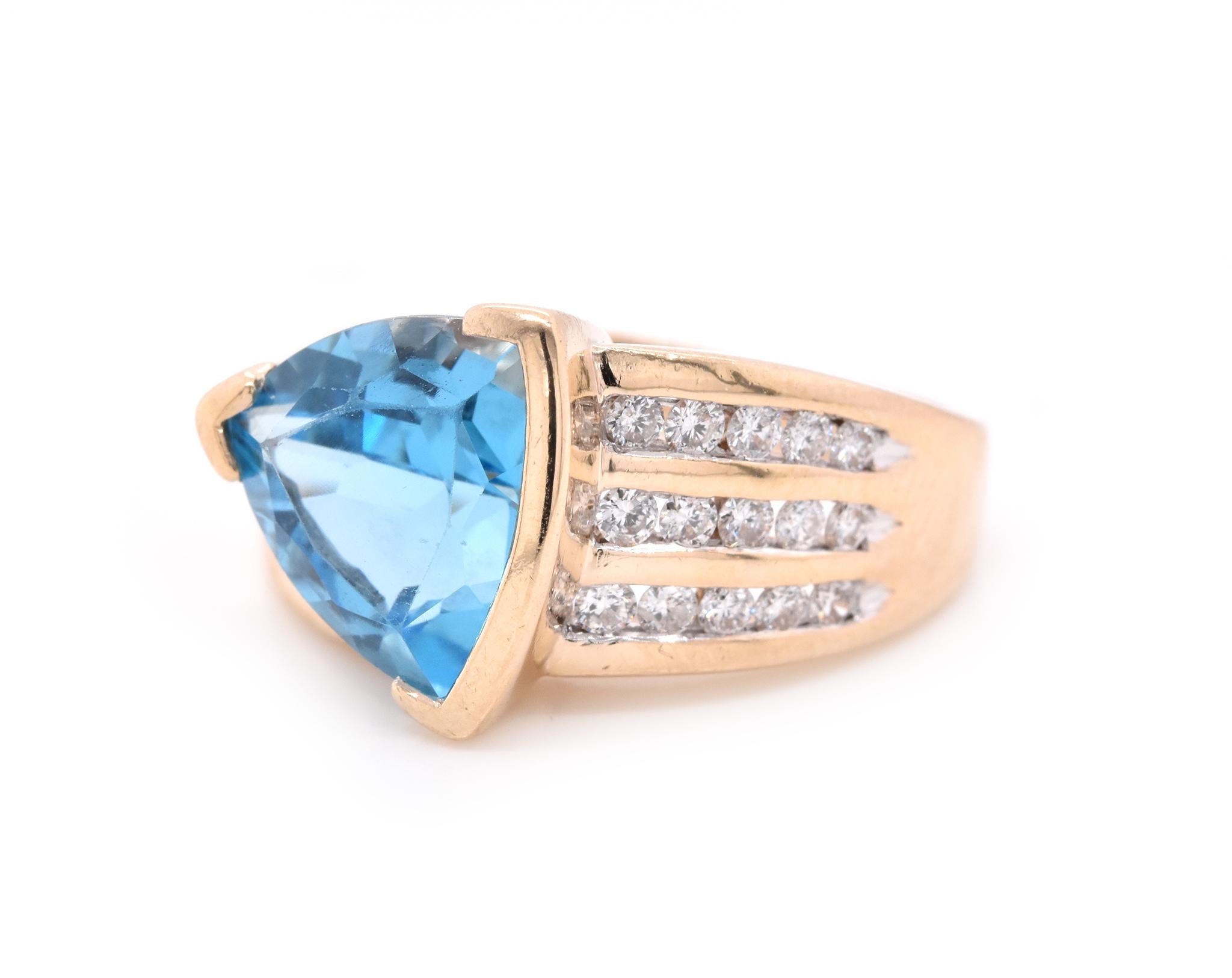 Trillion Cut 14 Karat Yellow Blue Topaz and Diamond Ring