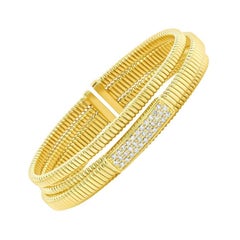 Brazalete flexible con pavé amarillo de 14 quilates