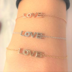 Bracelet d'amour en or jaune 14 carats avec diamants de 0,04 carat