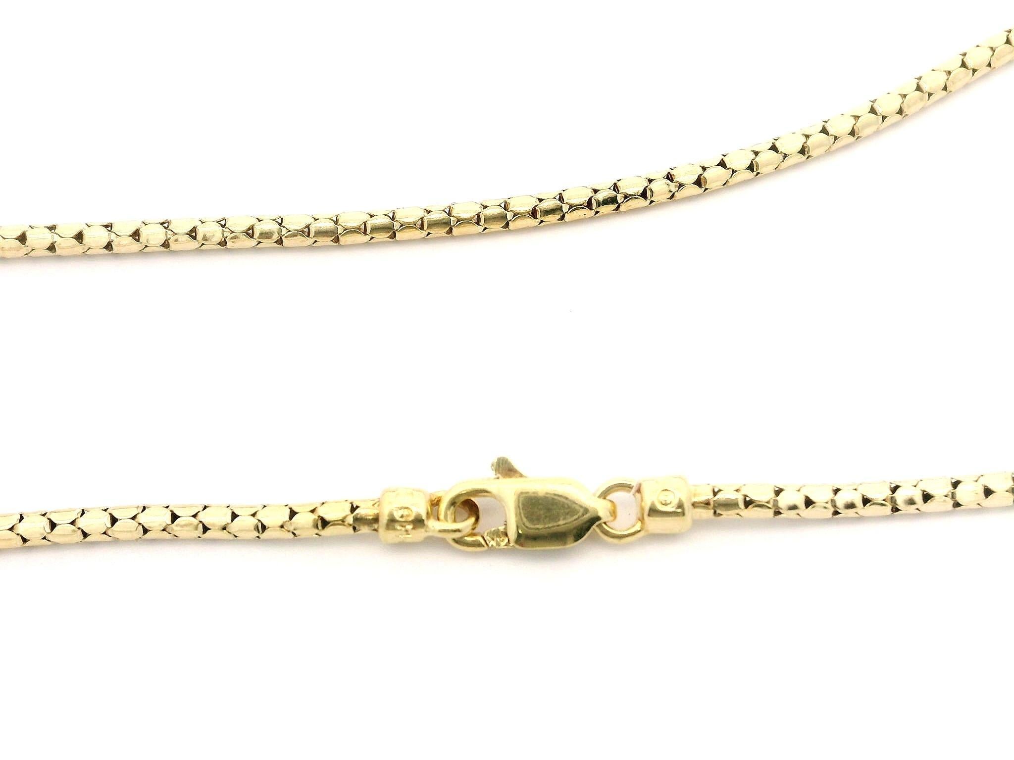 --Pietre: --
(5) Diamanti Nature autentici - Taglio rotondo Brilliante - Incastonati - Colore H - Purezza VS1 - 0,07ctw (circa)

Materiale: Oro giallo massiccio 14k
Peso: 8,58 grammi
Catena : 18
