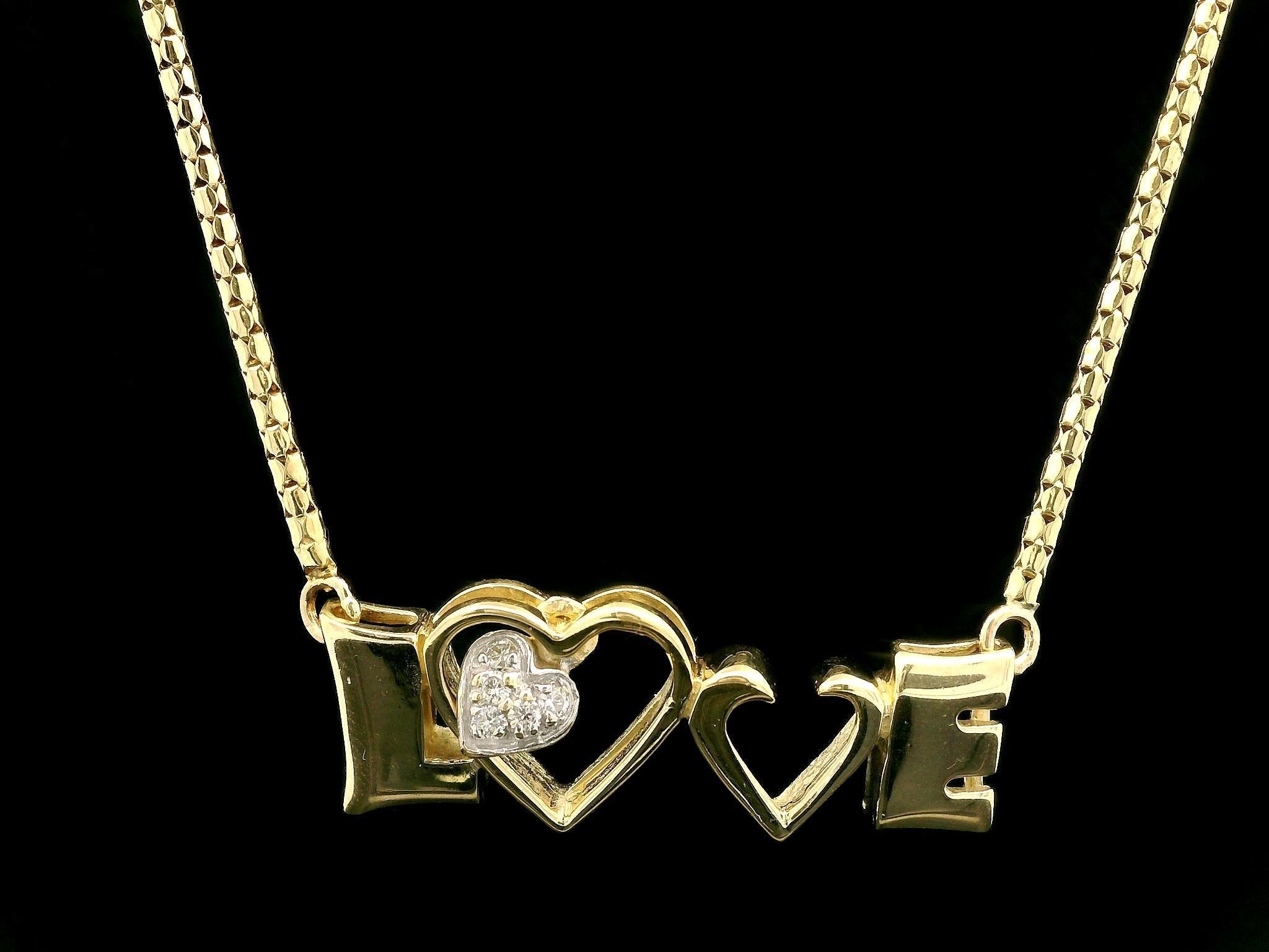 Donna Catena con ciondolo a forma di cuore d'amore in oro giallo 14k da 0,07 ct. in vendita