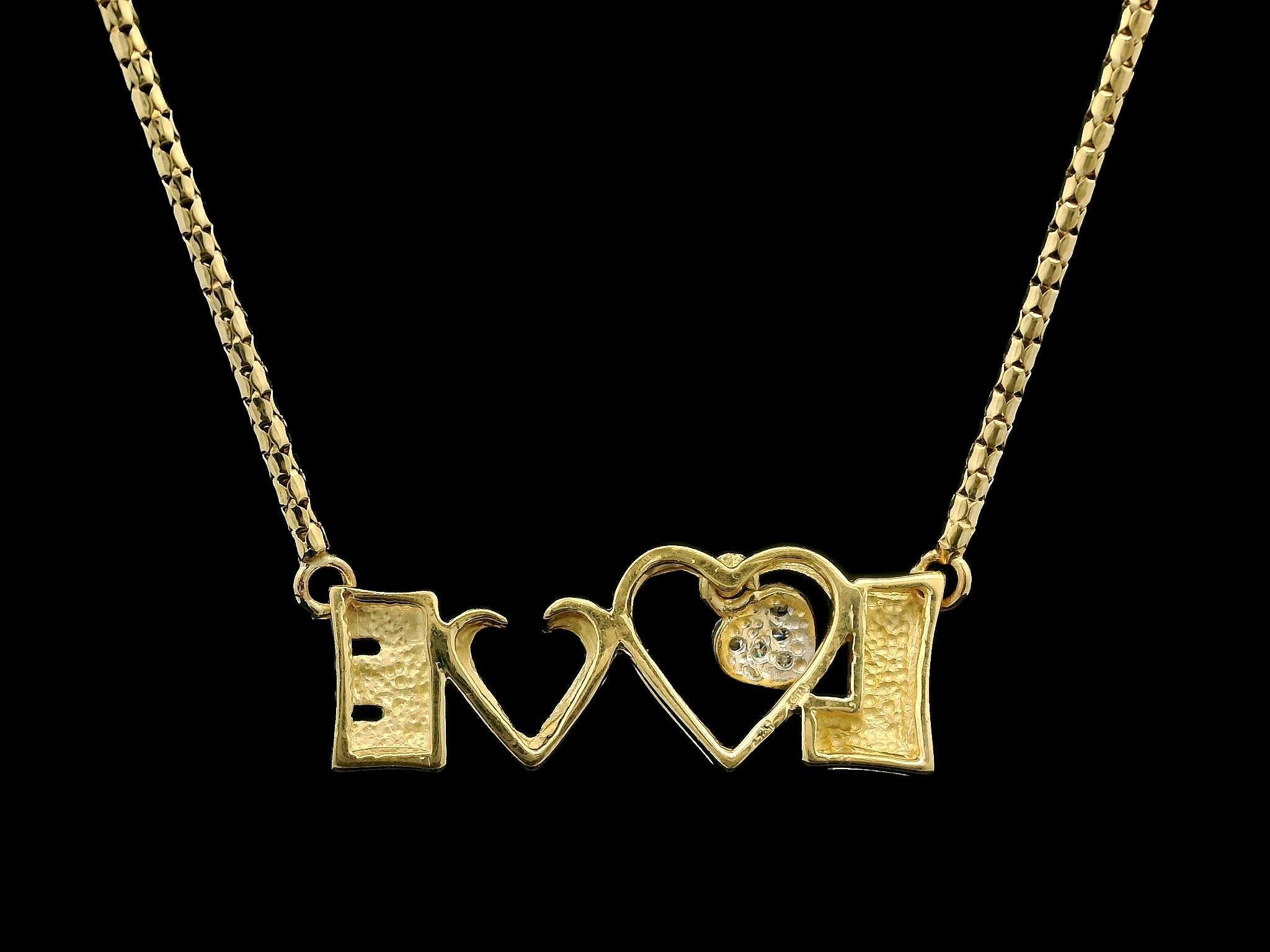 Catena con ciondolo a forma di cuore d'amore in oro giallo 14k da 0,07 ct. in vendita 1