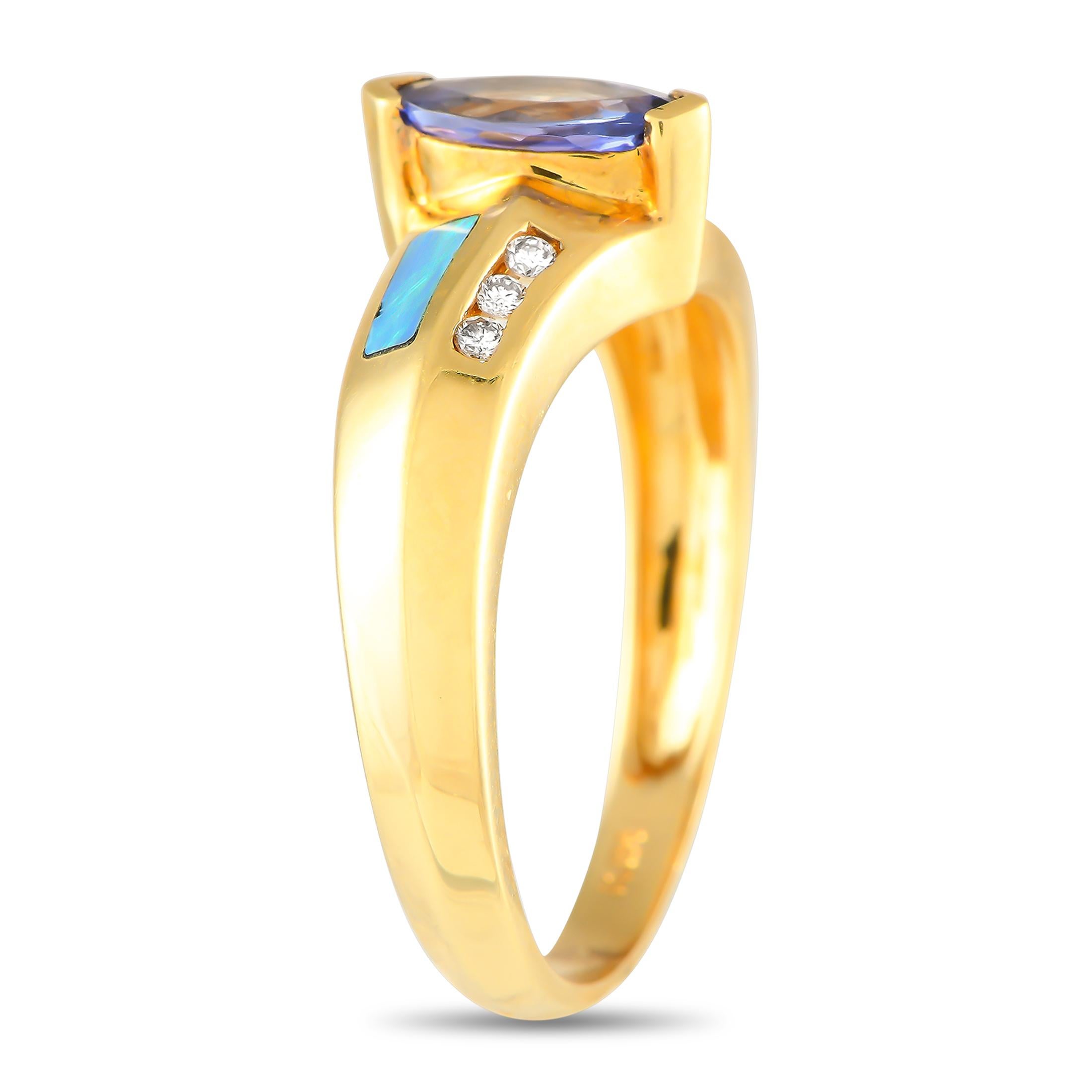 This radiant ring beautifully combines colors, textures, and materials. The simple 14K Yellow Gold setting comes to life thanks to colorful opalescent accents and inset Diamonds with a total weight of 0.09 carats. A marquise-cut 0.50 carat Tanzanite