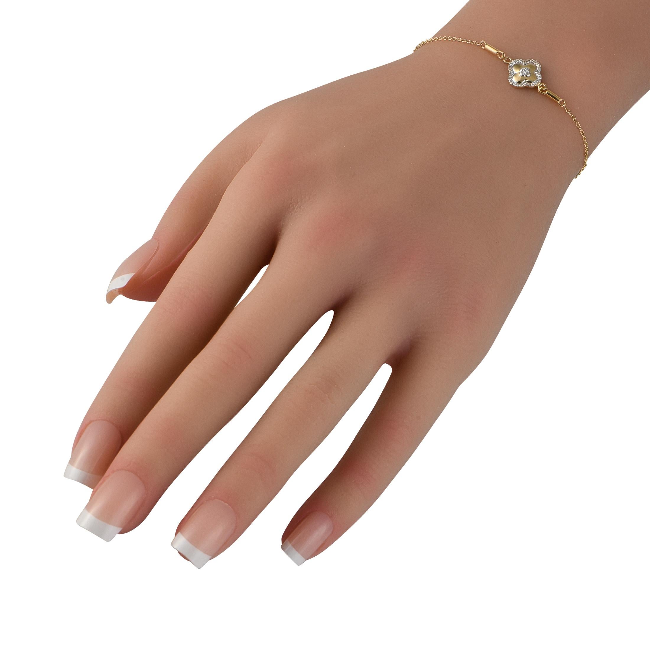 This 14K Yellow Gold bracelet is classically elegant. At the center, a quatrefoil motif is elevated by 0.10 carats of sparkling Diamonds. It measures 7.25 long and is understated enough for everyday wear.This jewelry piece is offered in brand new