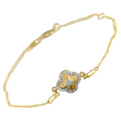 Bracelet en or jaune 14 carats avec diamants de 0,10 carat