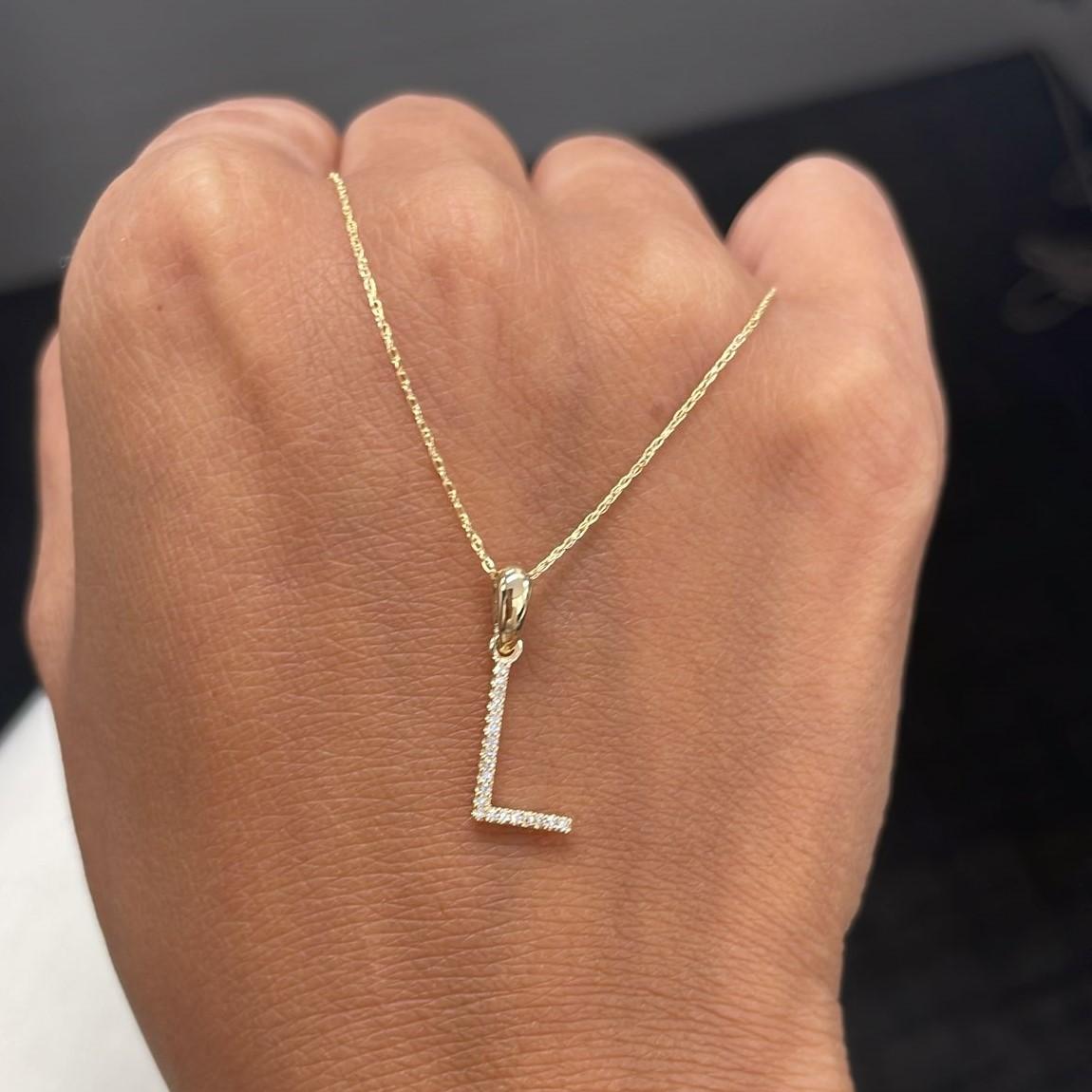 Alphabet Initial Pendant Necklace: Beautiful gold necklace perfectly sized at 16-18 inches in chain length an initial diameter 13mm featuring round diamonds between 0.09 ct - 0.12, allowing you to show off your name, new last name or alma mater.
