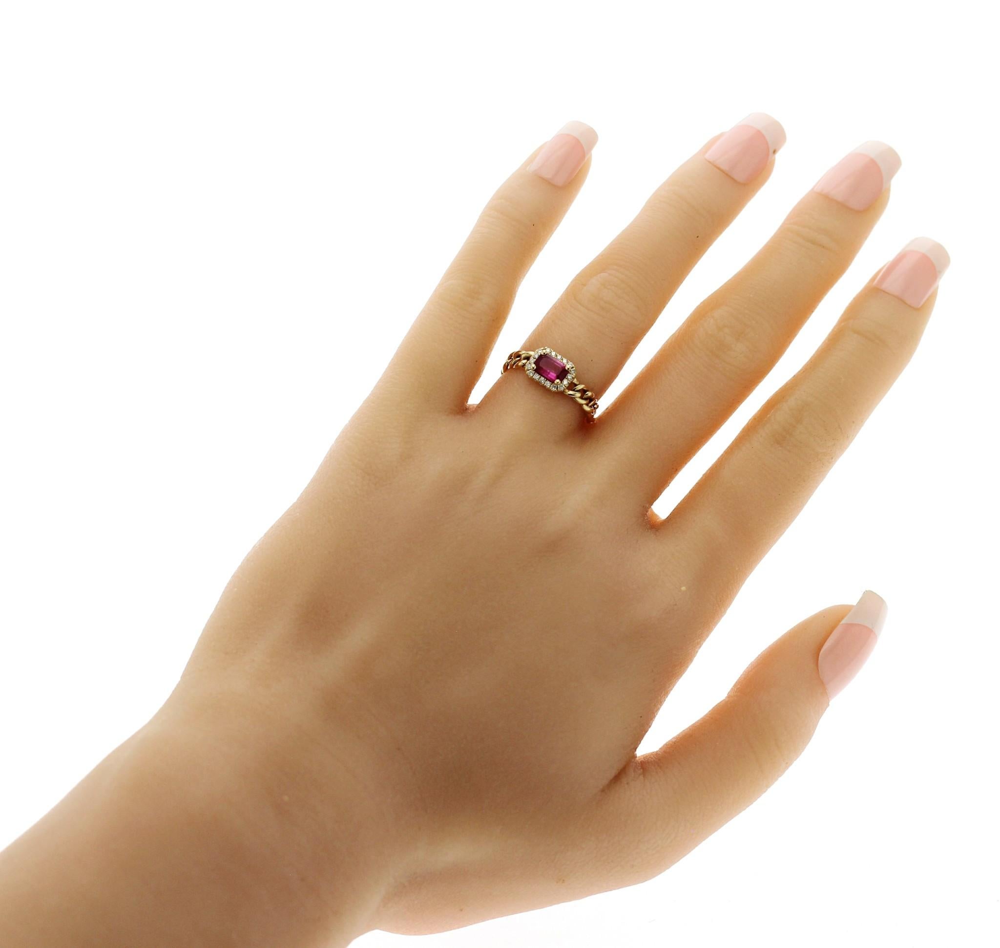 100% Authentic, 100% Customer Satisfaction 
Top: 6 mm
Band Width: 2.3 mm
Metal: 14K Yellow Gold 
Size: 6
Hallmarks: 14K 
Total Weight: 2.2 Grams
Stone: Diamond, Approximately 0.11 CT Clarity: VS2-I1 Color: H-M and Ruby 0.60 CT
Condition: