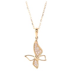 Collier avec pendentif en or jaune 14 carats serti d'un diamant rond de 0,12 carat