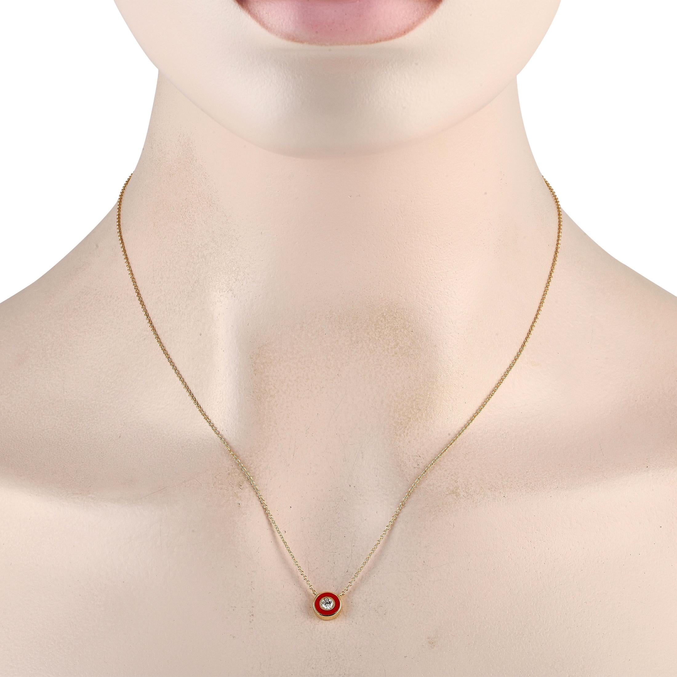 This sleek, simple necklace is an easy way to add a pop of color to any ensemble. At the center of this pieces 18 chain, youll find a circular 14K Yellow Gold pendant measuring 0.35 round. A 0.13 carat bezel-set Diamond surrounded by an inset red